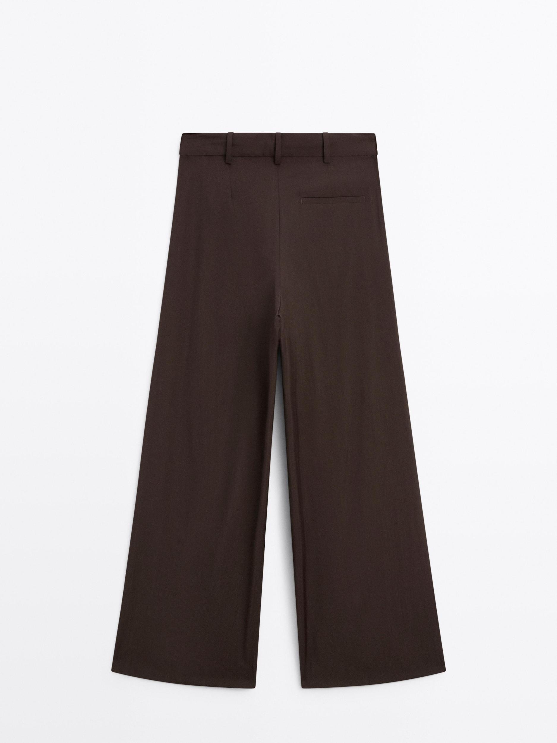 Flowing trousers with darts Product Image