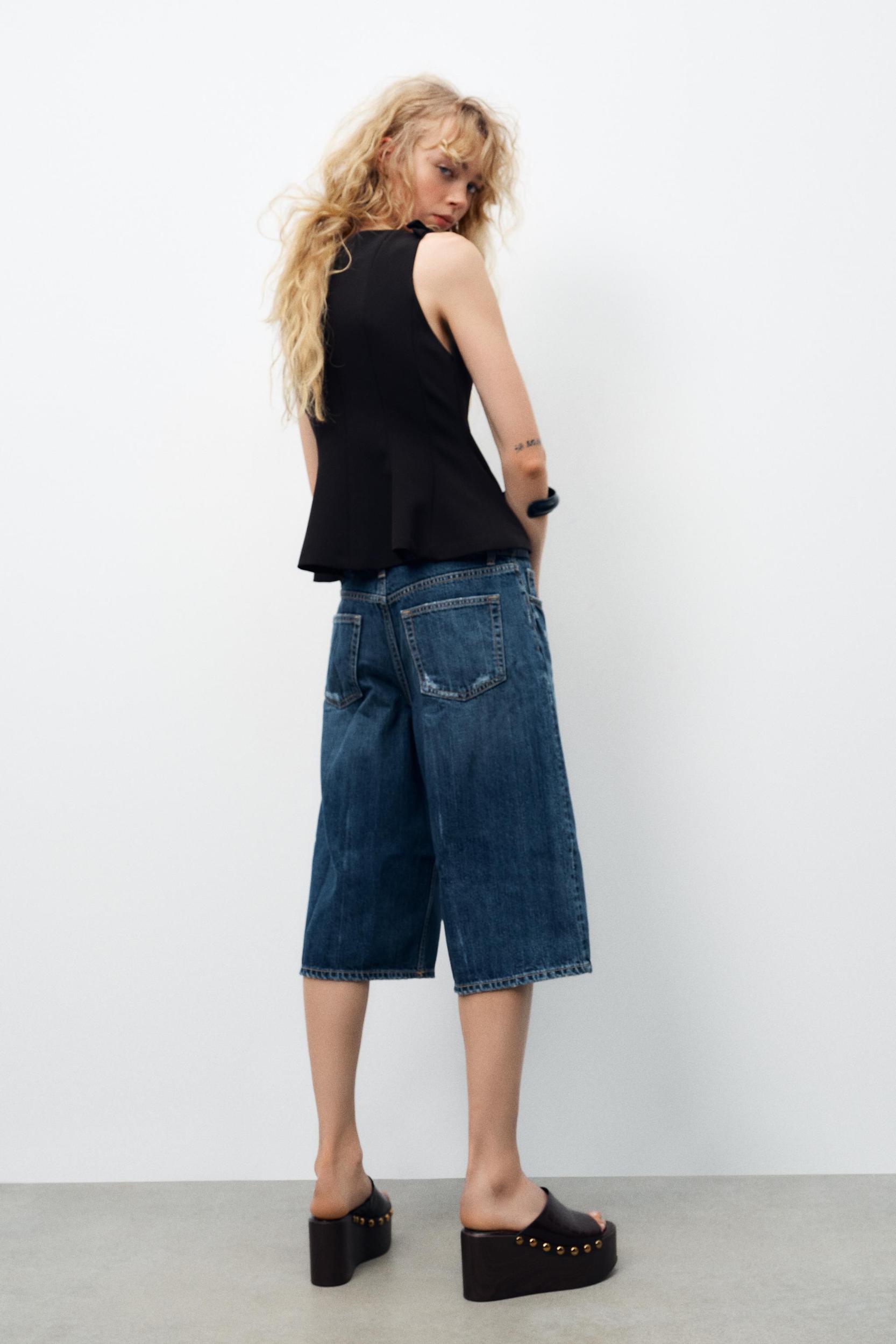 PEPLUM BOWS TOP Product Image