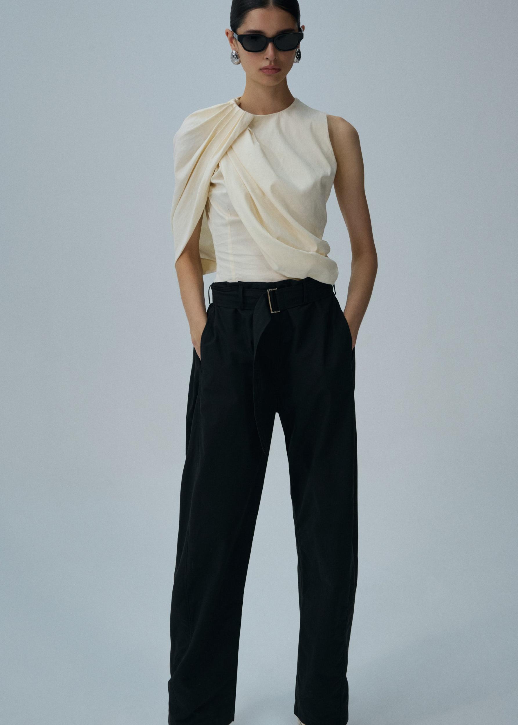 Asymmetric draped top in cream Product Image