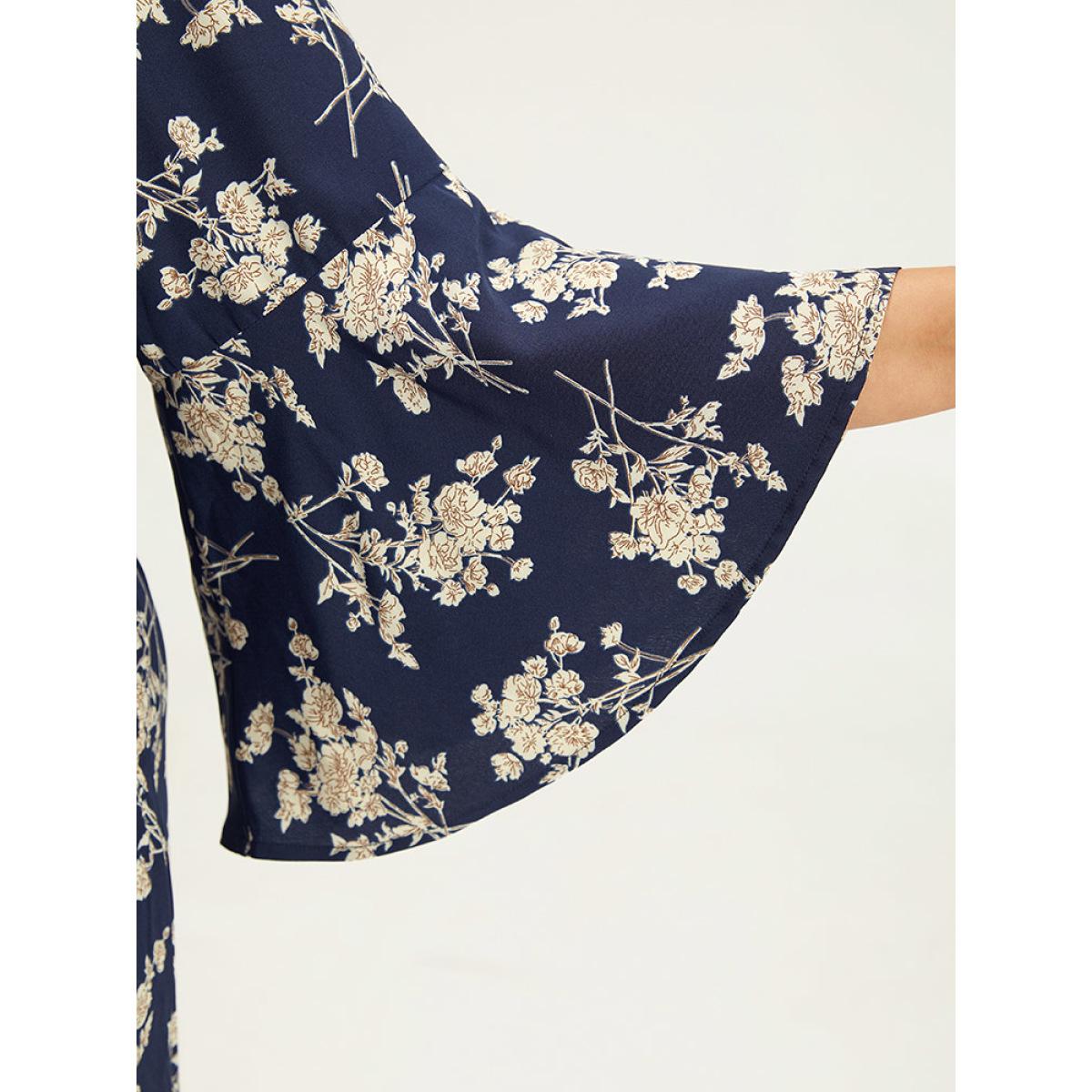 Plus Size DarkBlue Floral Print Bell Sleeve Pocket Belted Jumpsuit Women Elegant Elbow-length sleeve V-neck Dailywear Loose Jumpsuits BloomChic 30/6X Product Image