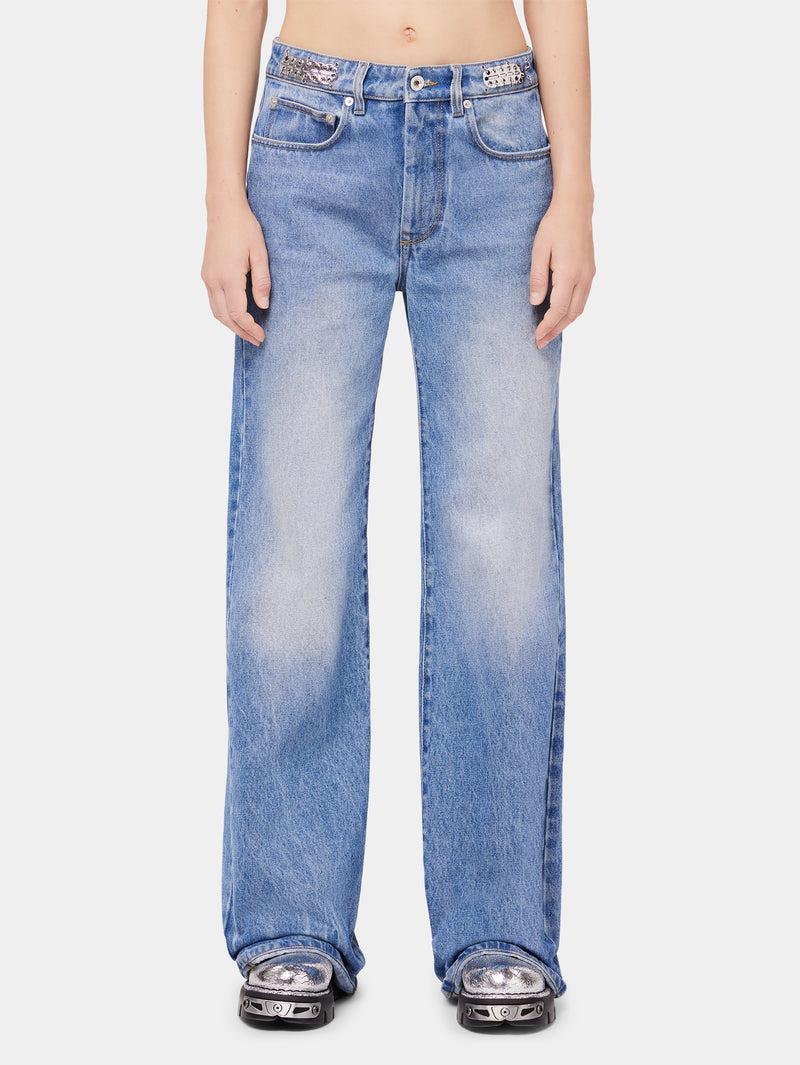 Flared jeans embellished with 1969 discs Product Image