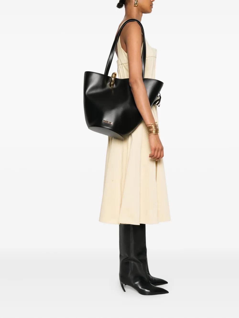 JACQUEMUS The Medium Bambola Asymmetric Leather Bucket Bag In Black 990 Product Image