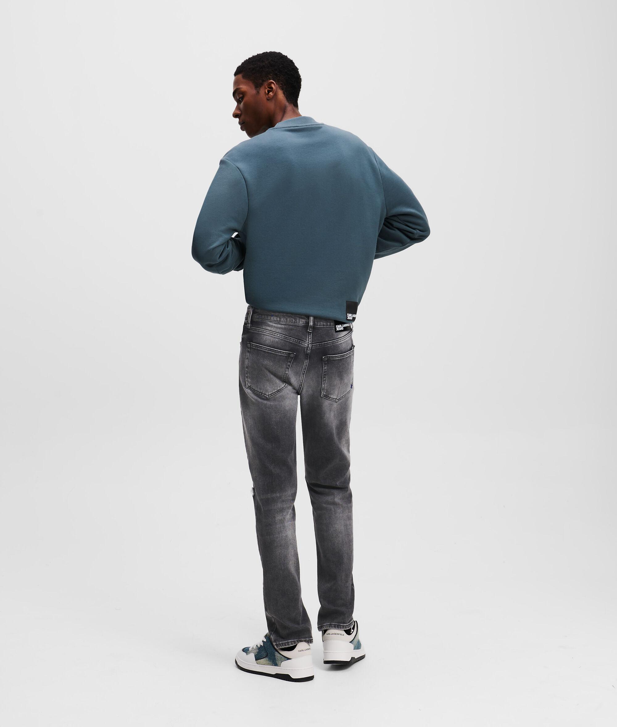 DISTRESSED SLIM JEANS Product Image