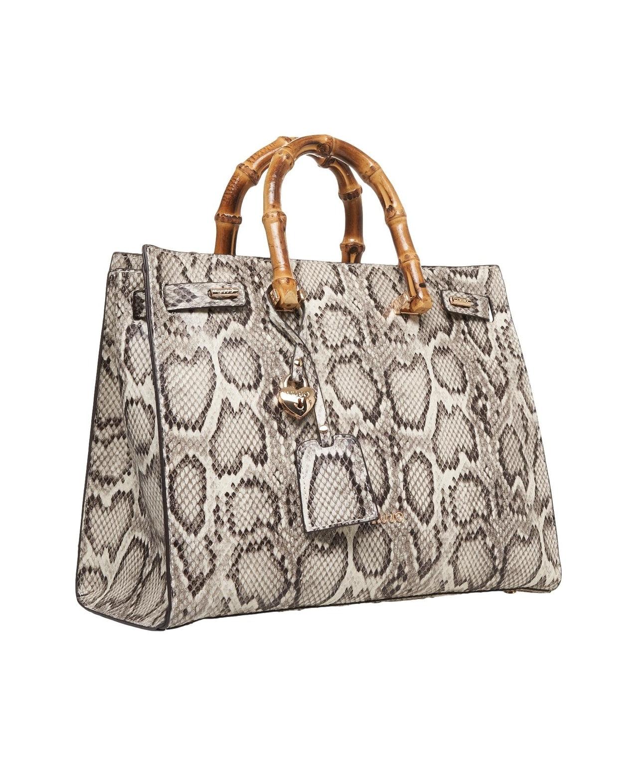Hand bag with snake pattern Product Image