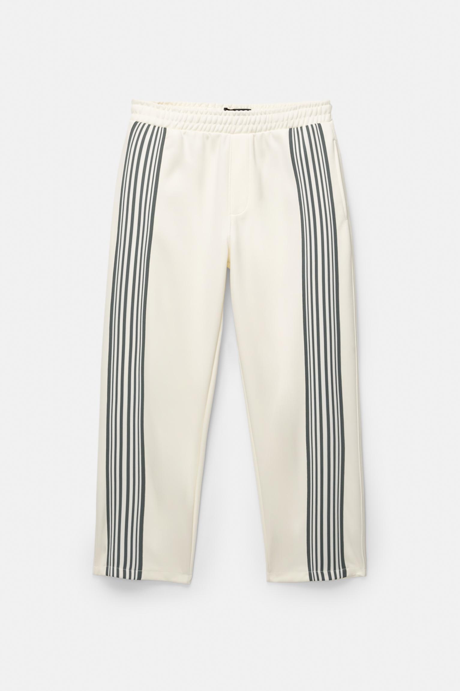 STWD tracksuit bottoms with side stripes Product Image