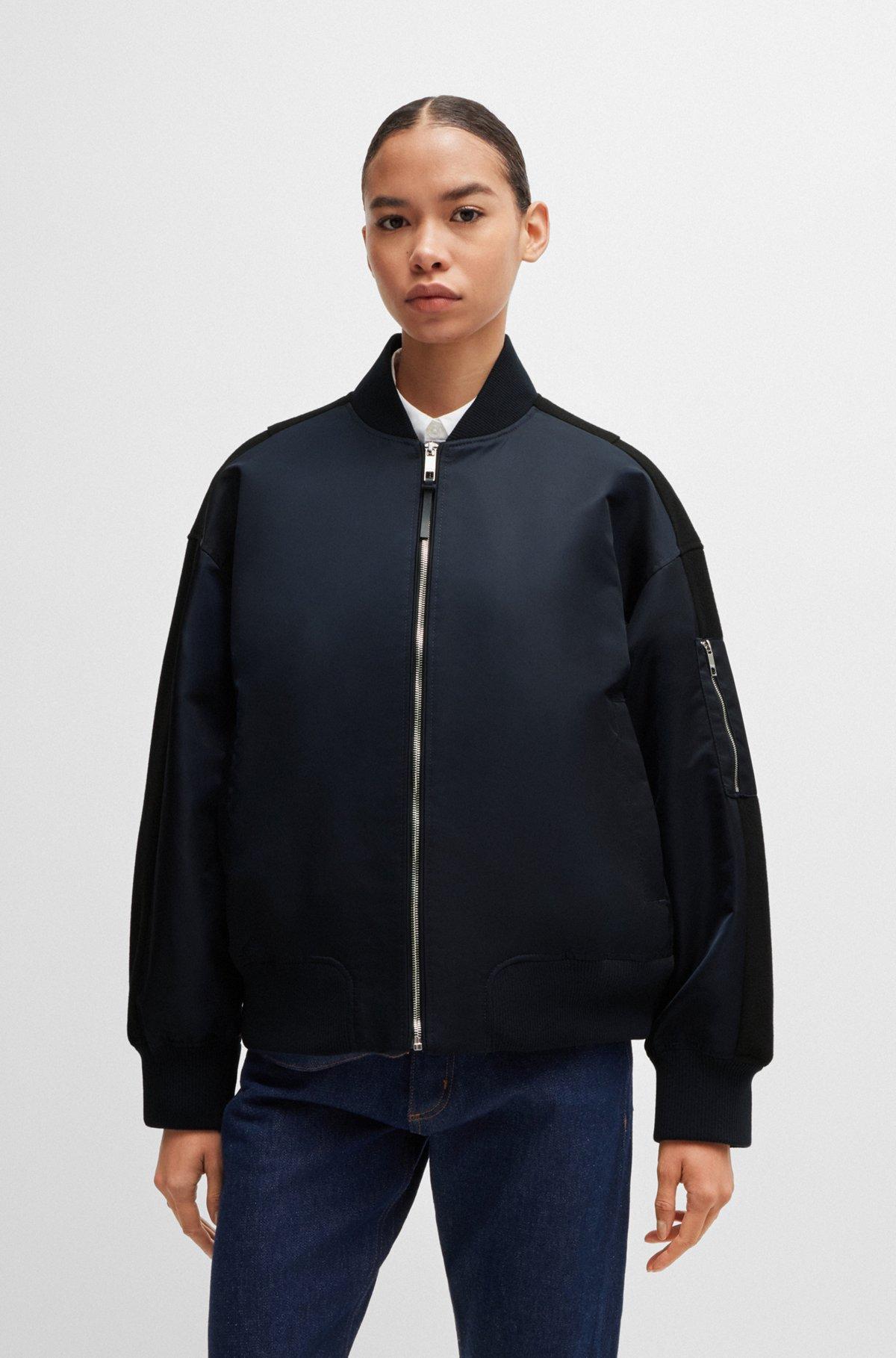Water-repellent bomber jacket with zipped sleeve pocket Product Image