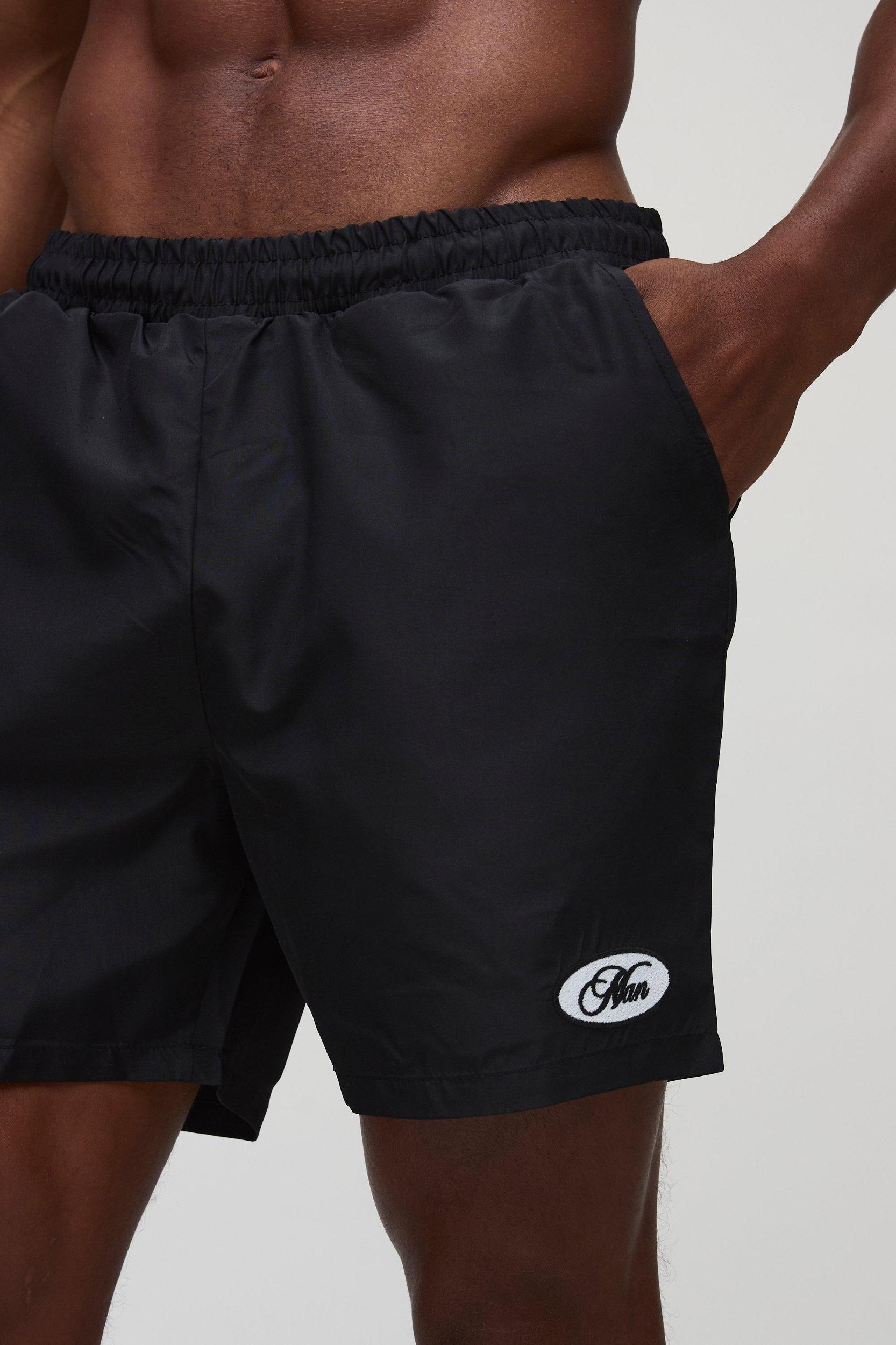Mid Length Embroidered Stripe Swim Short | boohooMAN USA Product Image