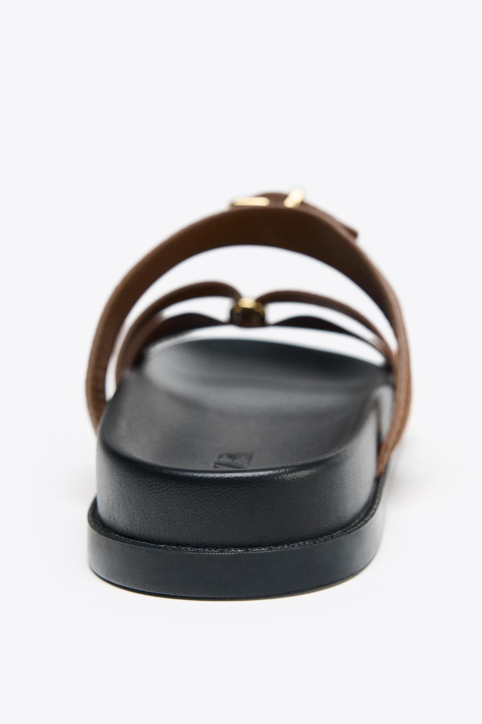 SUEDE CROSSED STRAP SANDALS Product Image