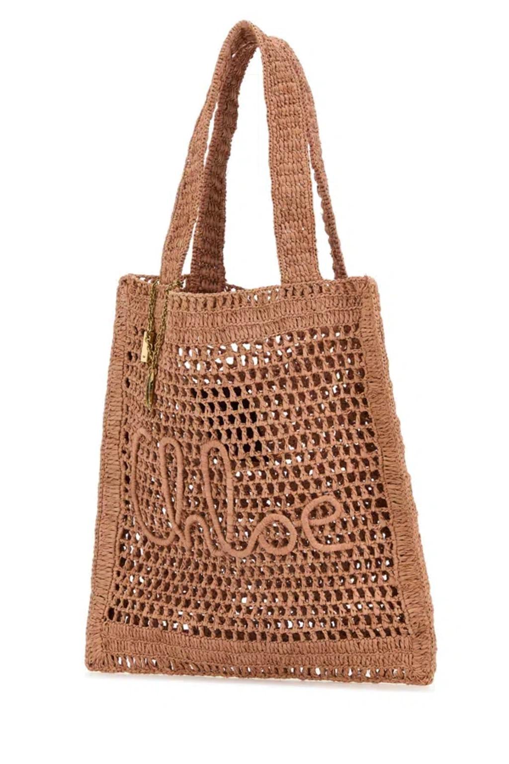 CHLOÉ Chloe Women Antiqued Pink Raffia Estate Banana Shopping Bag In Pattern Product Image