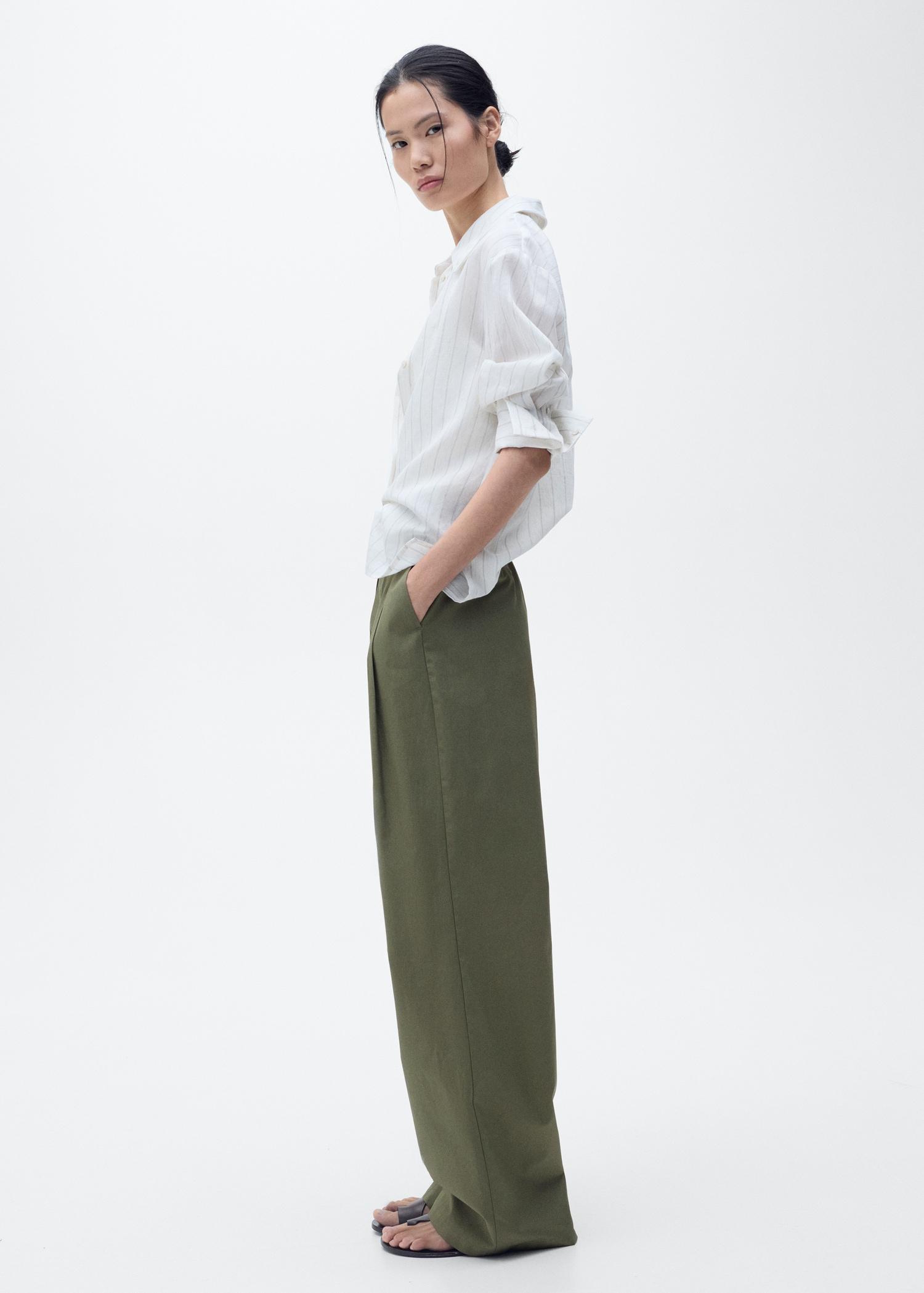 Wide-leg pants with belt - Women | MANGO USA Product Image