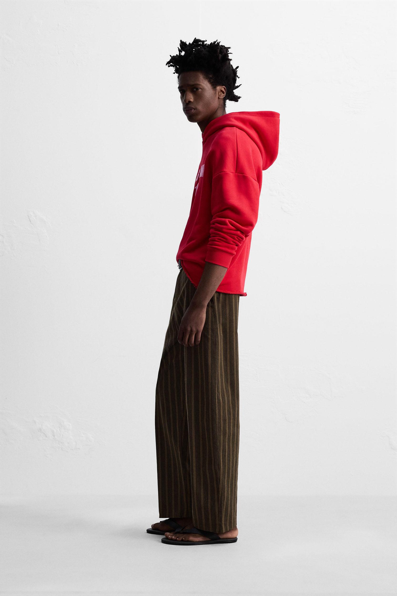 STRIPED BALLOON FIT PANTS © OTIS KWAME KYE QUAICOE Product Image