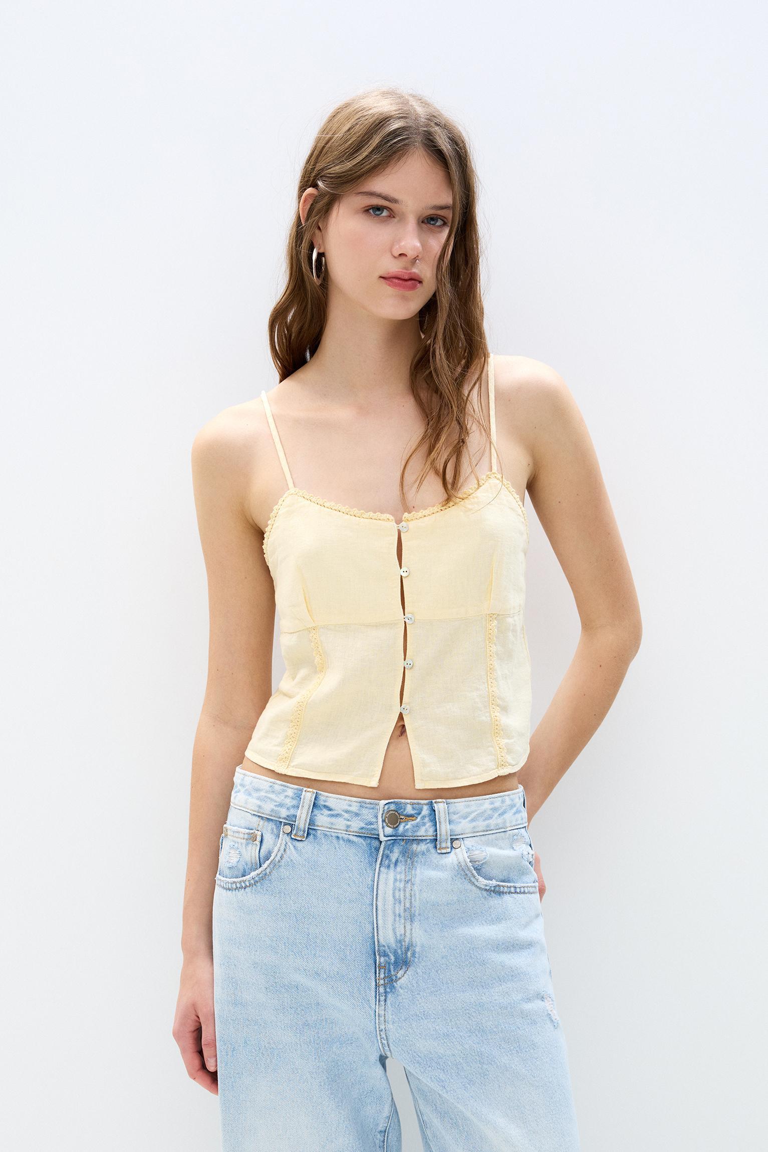 Lace-trimmed top with straps Product Image