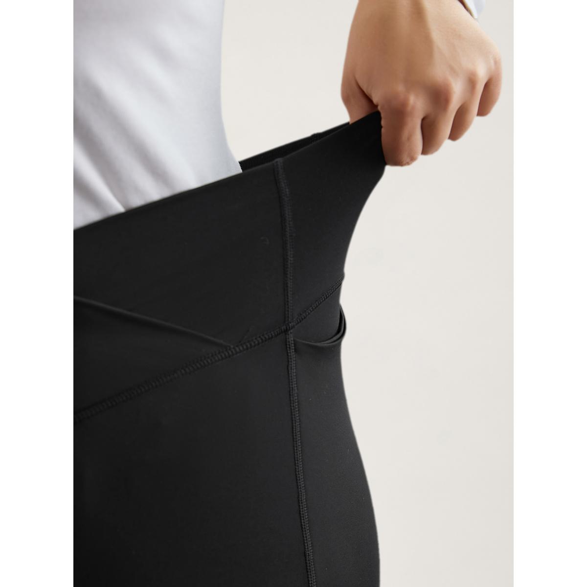 Plus Size Criss-Cross Waist Pocket Tight Pants Women Black Elegant High stretch Skinny Mid Rise Everyday Leggings BloomChic 22-24/3X Product Image