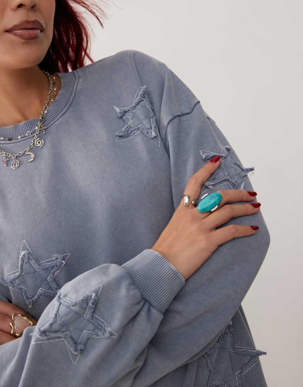 Monki oversized sweatshirt with applique stars in washed blue Product Image