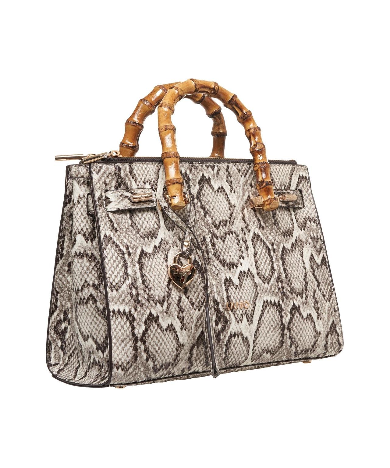 Hand bag with snake pattern Product Image