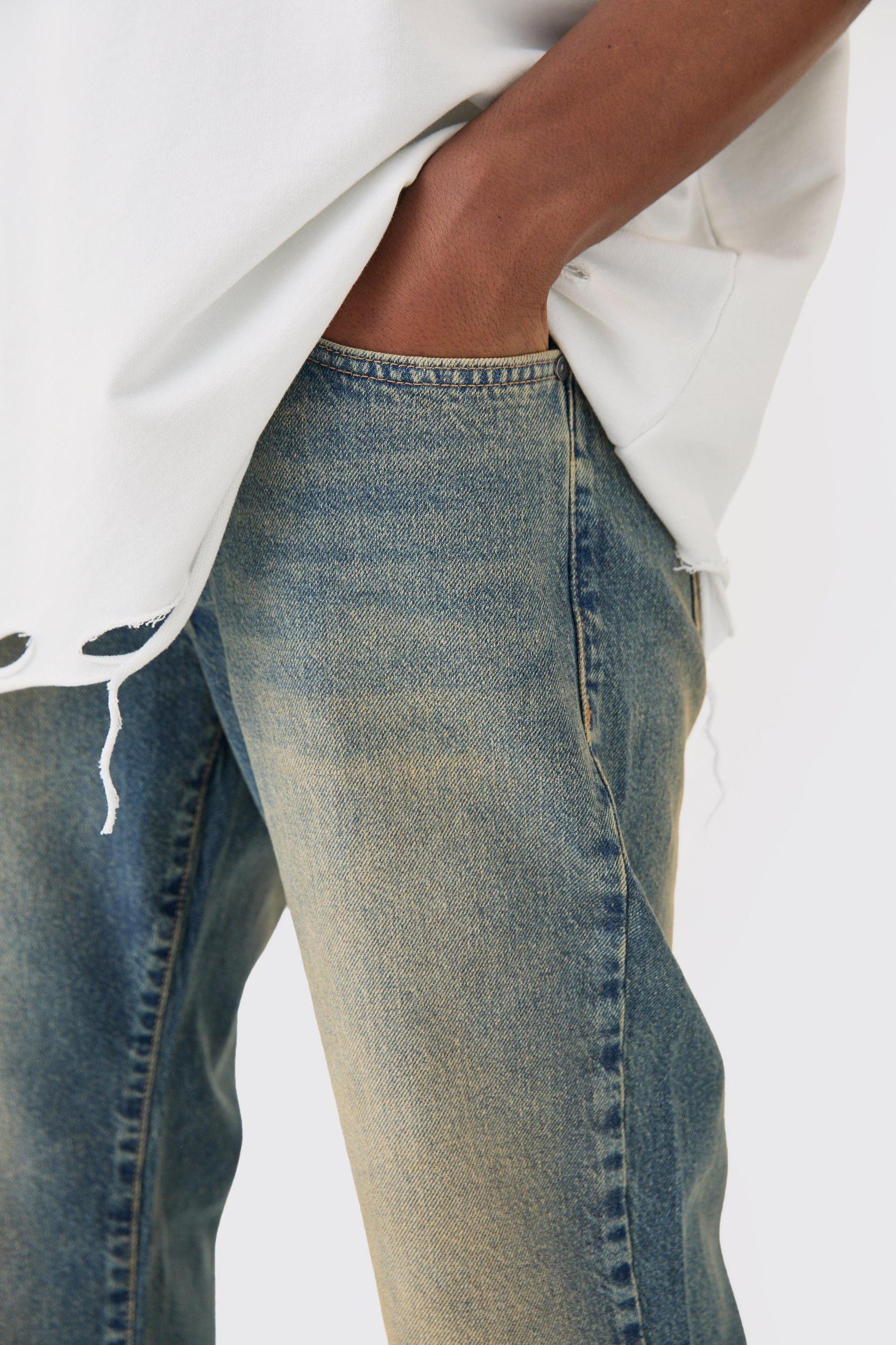 Relaxed Flare Rigid Knee Rip Tinted Denim Jean | boohooMAN USA Product Image