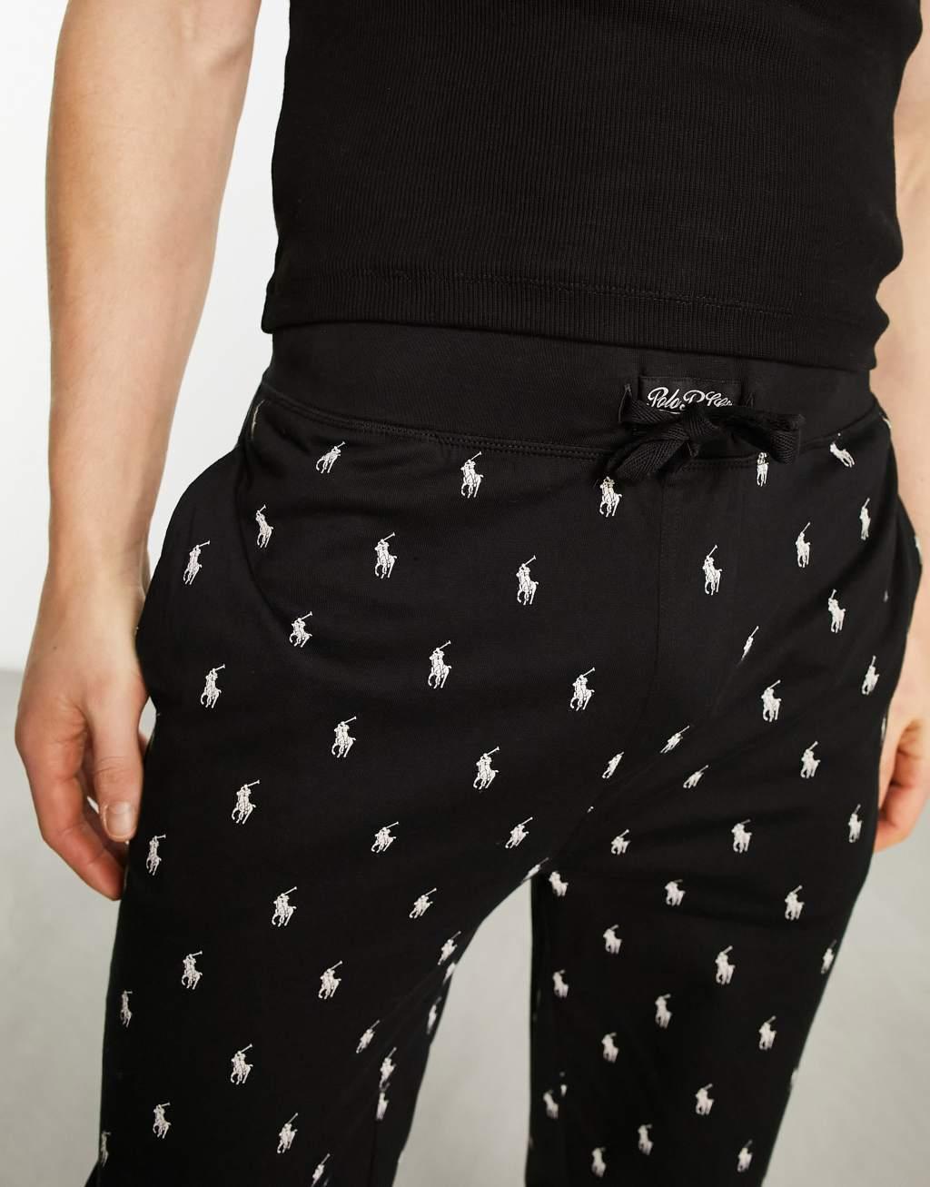 Polo Ralph Lauren loungewear sweatpants in black with all over pony logo Product Image