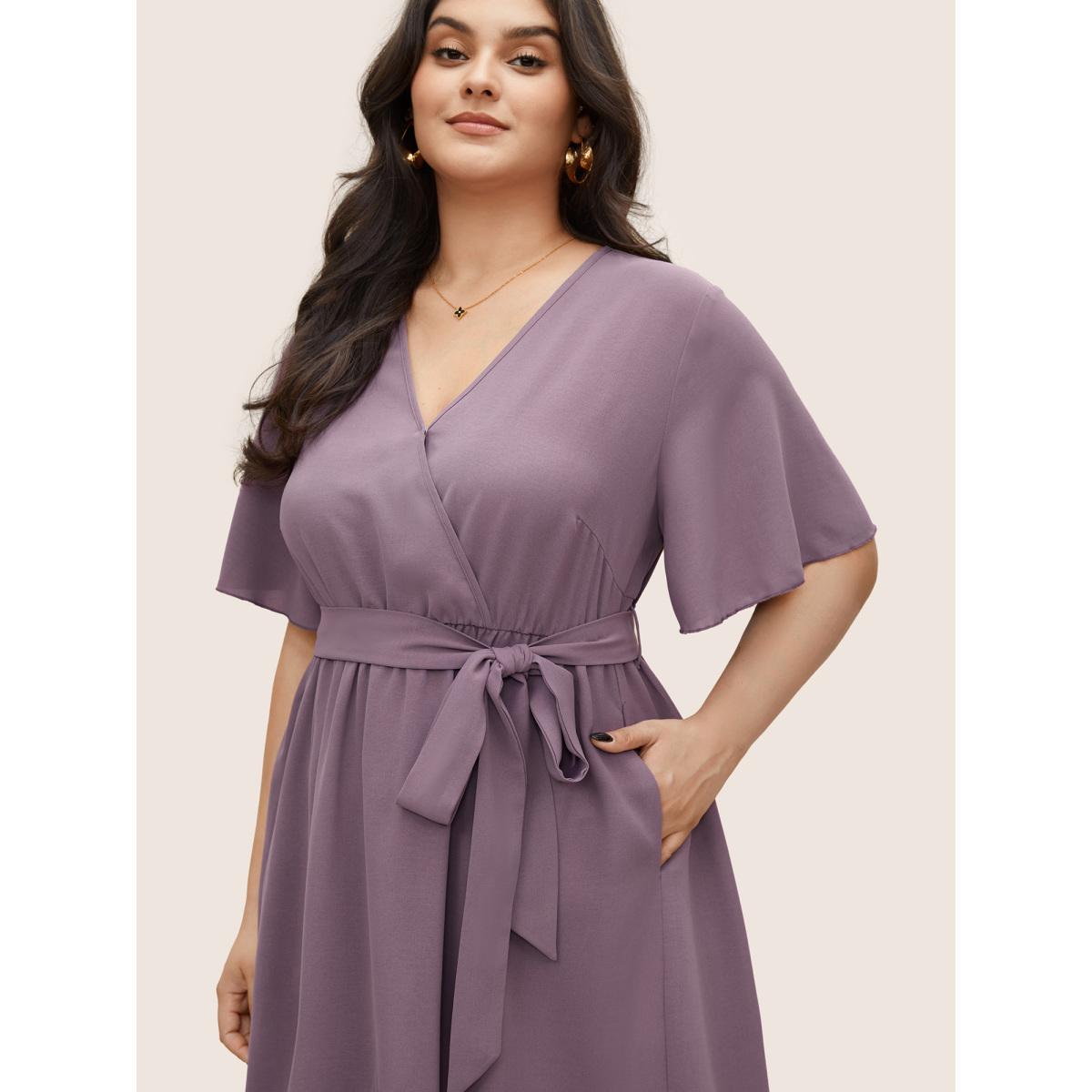 Plus Size Bloom Dress - Solid Tie Surplice Ruffle High Low Dress Plum Women Romantic Cross straps V-neck Short sleeve Curvy Midi Dress BloomChic 10/M Product Image