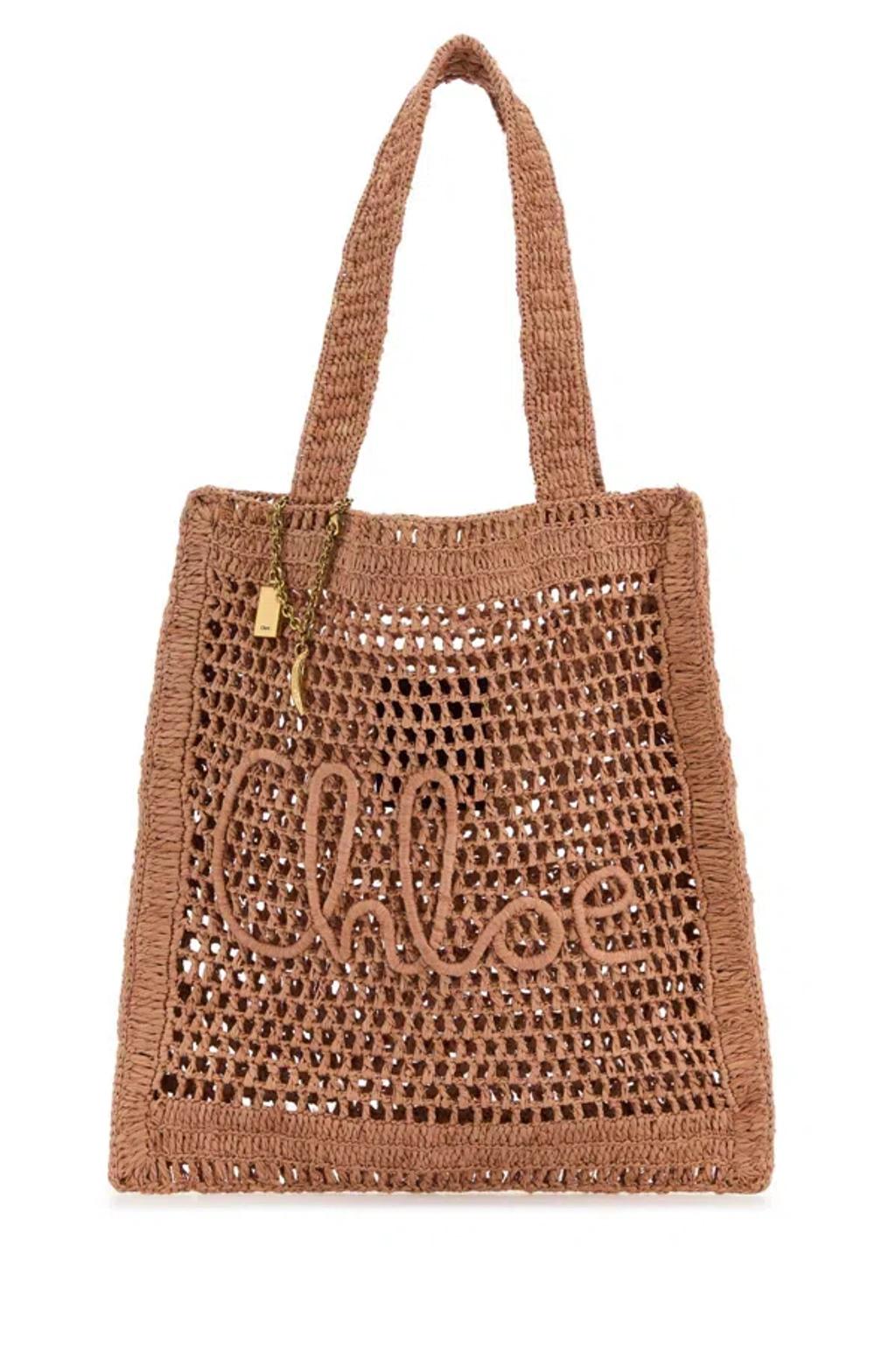 CHLOÉ Chloe Women Antiqued Pink Raffia Estate Banana Shopping Bag In Pattern Product Image