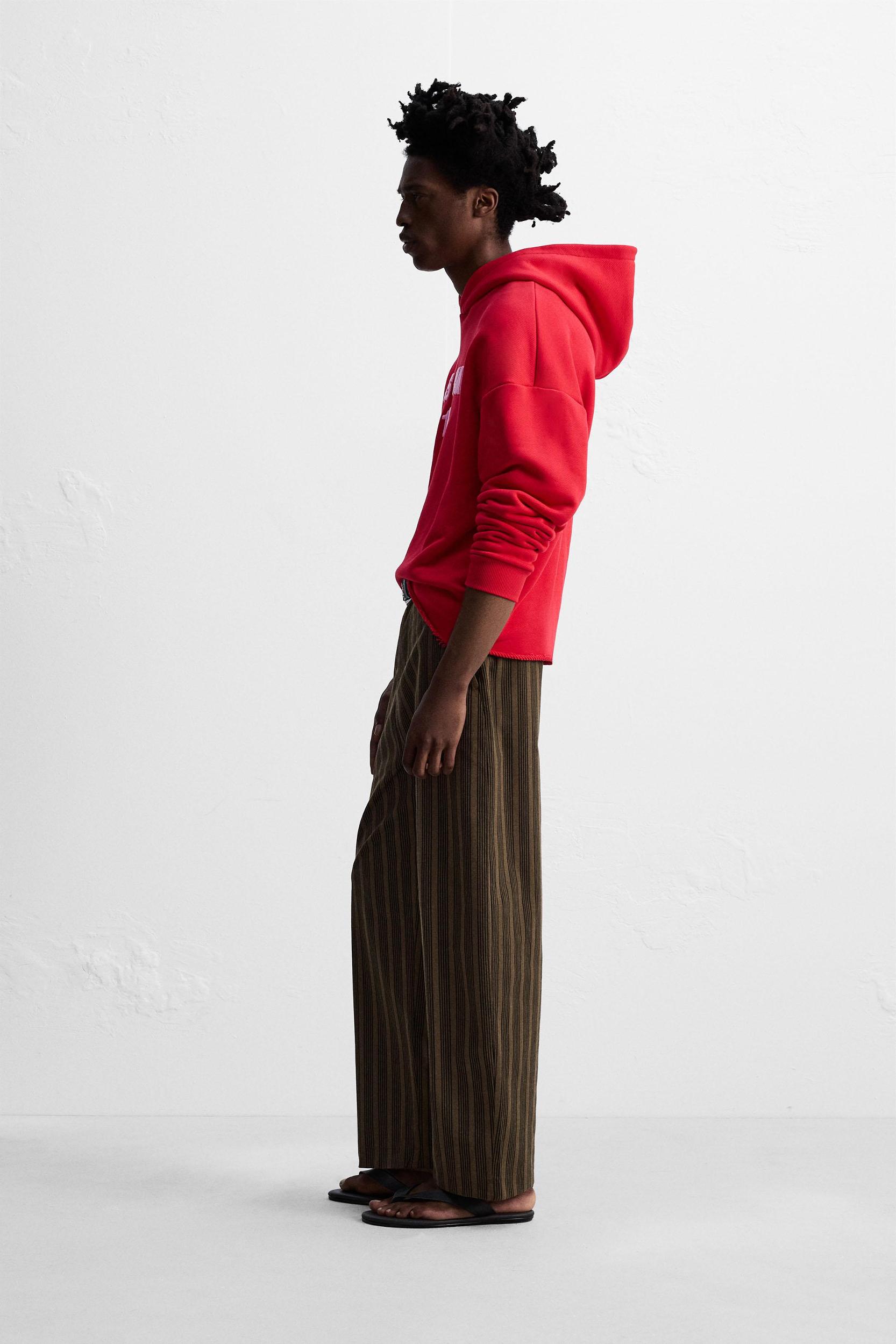 EMBROIDERED HOODIE SWEATSHIRT © OTIS KWAME KYE QUAICOE Product Image