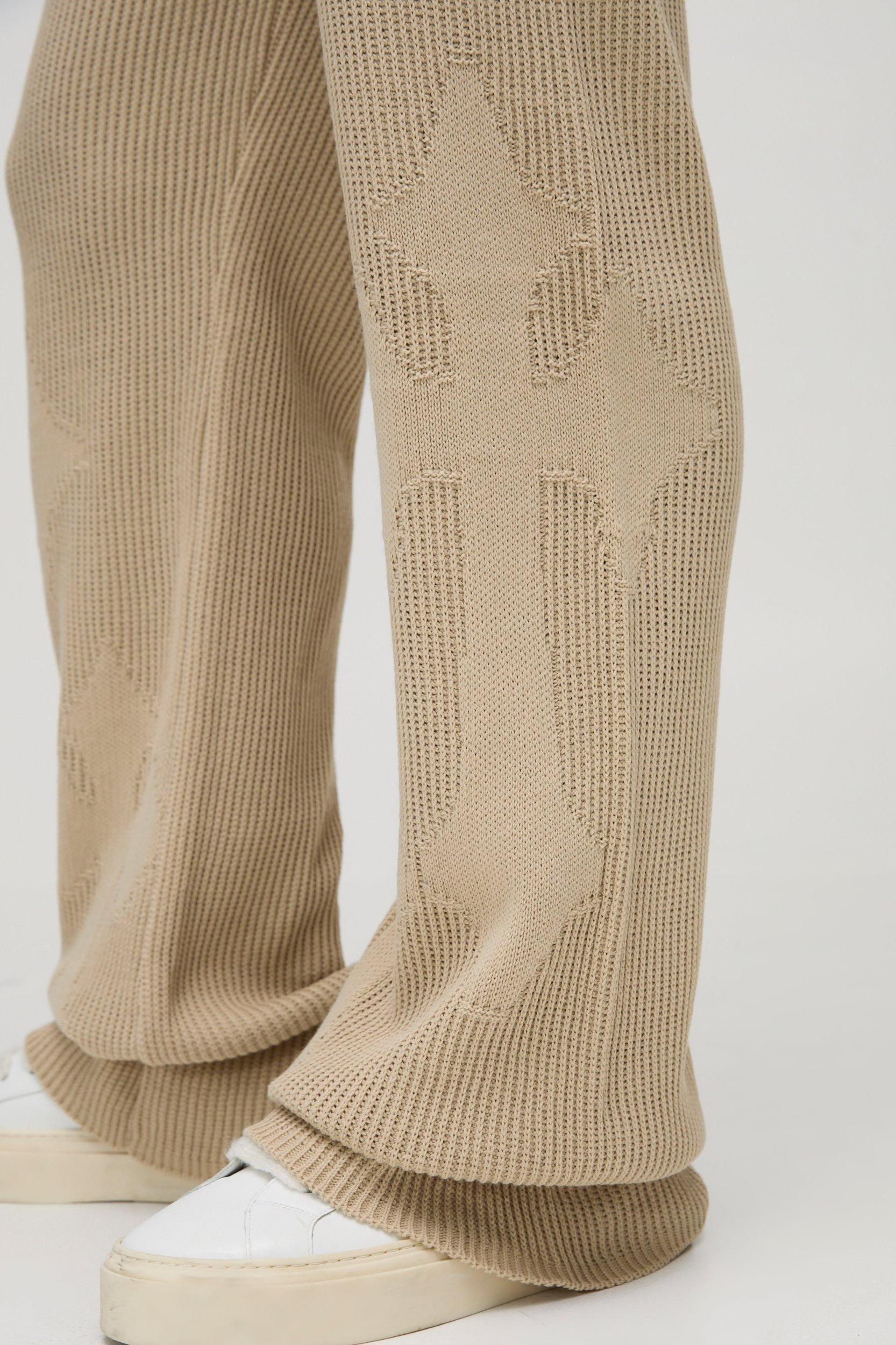 Slim Fit Flared Ribbed Cross Knitted Sweatpants | boohooMAN USA Product Image