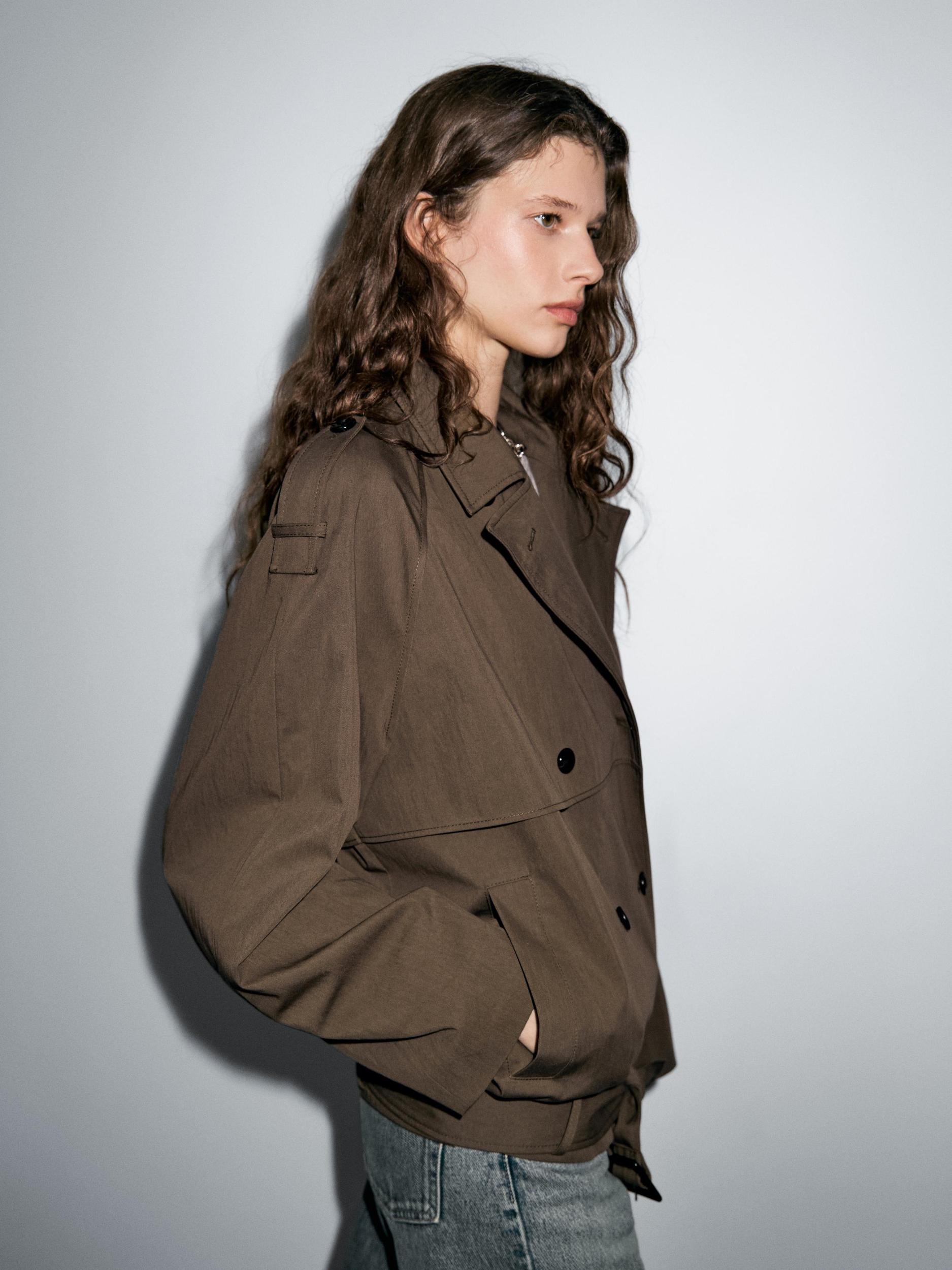 Short trench coat with belt detail Product Image