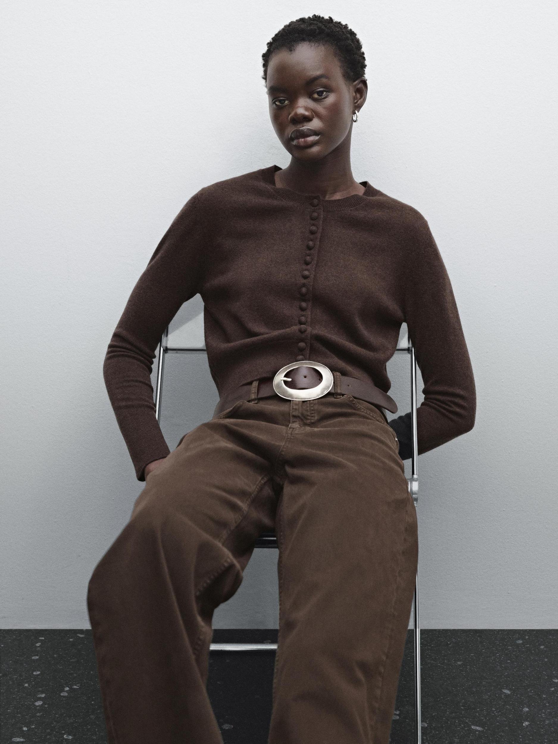 Short knit cardigan with covered buttons Product Image