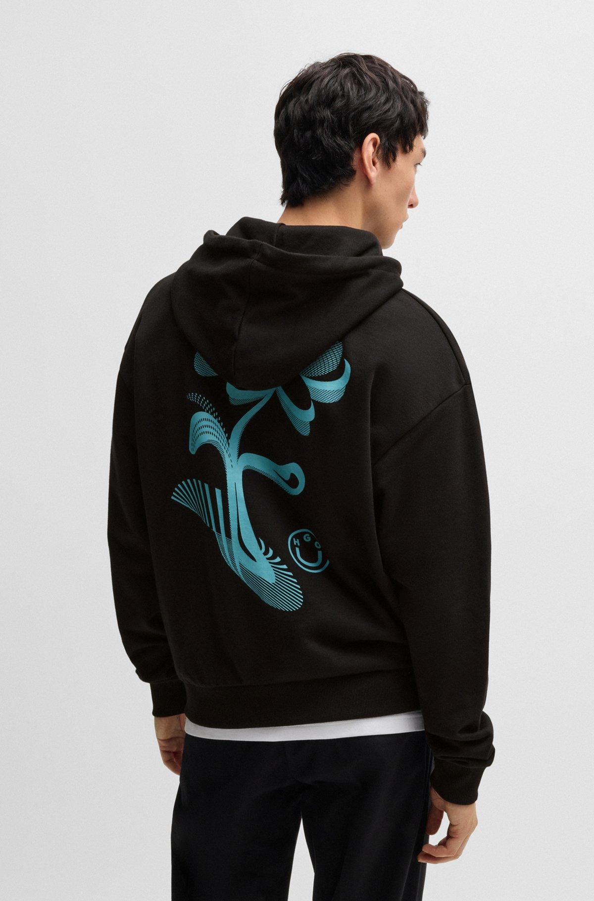 Cotton-terry zip-up hoodie with seasonal artwork Product Image