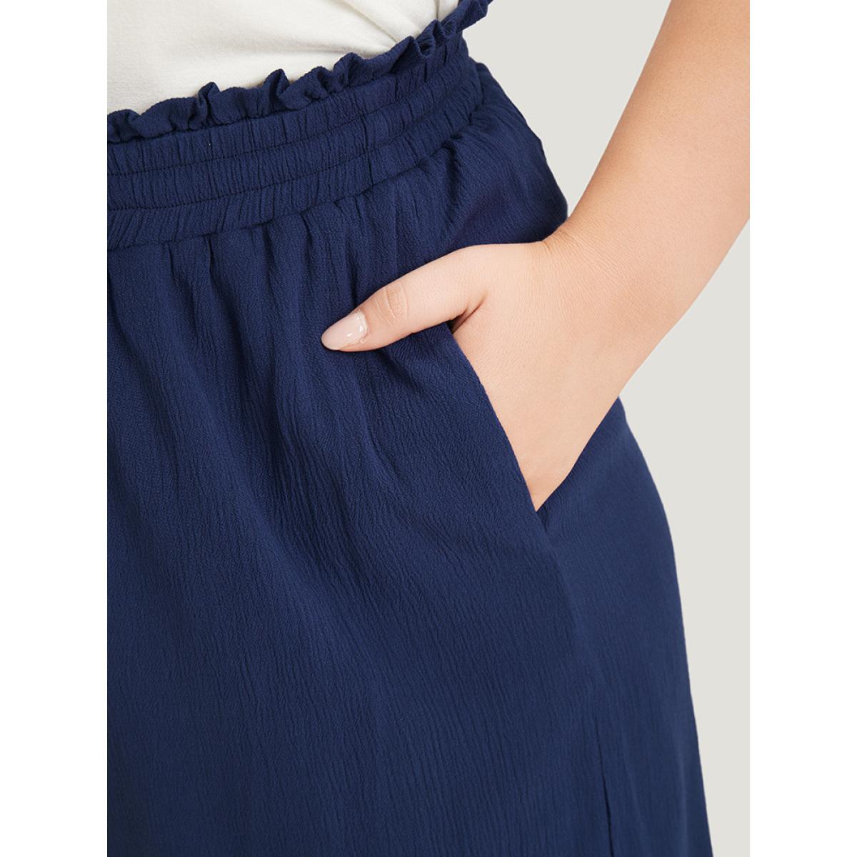 Plus Size Solid Paperbag Waist Asymmetrical Hem Wide Leg Pants Women Indigo Elegant High Rise Dailywear Pants BloomChic 12/L Product Image