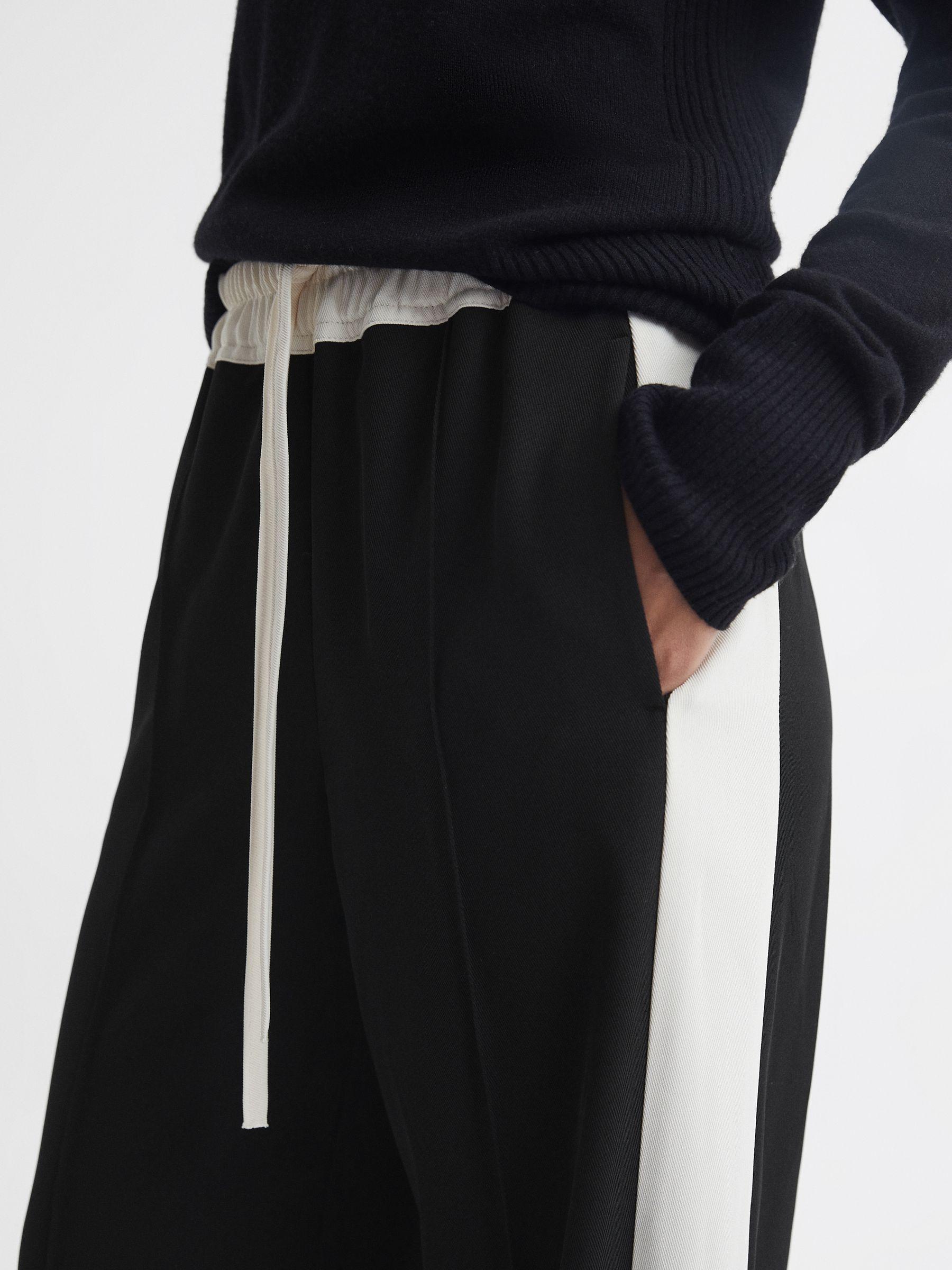 Petite Wide Leg Contrast Stripe Drawstring Trousers in Black Product Image