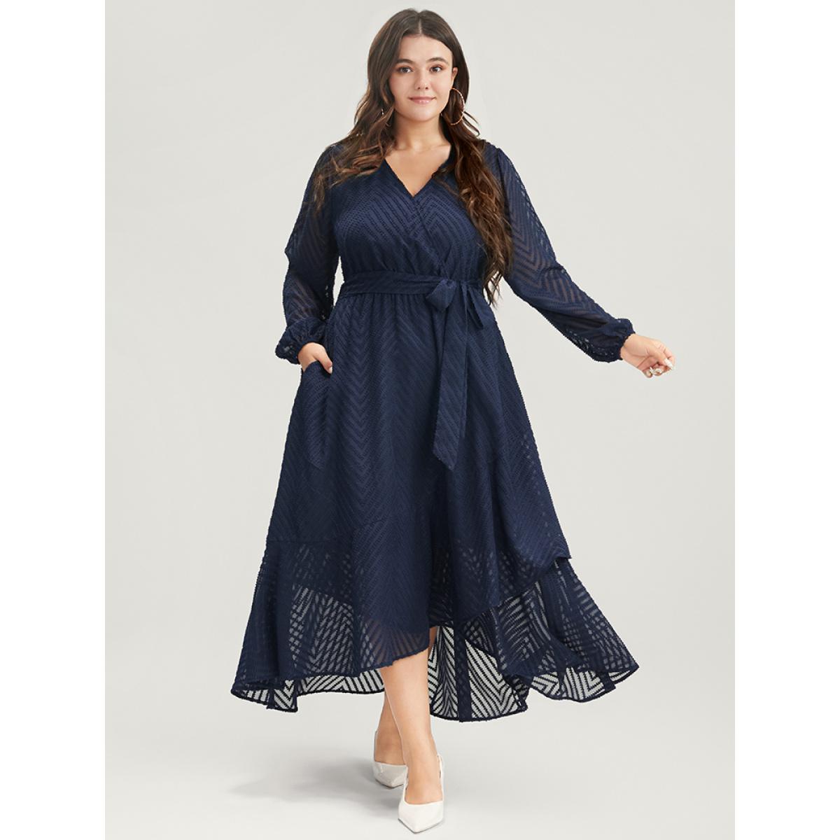 Plus Size Solid Geometric Wrap Pocket Belted Asymmetrical Hem Dress DarkBlue Women Glamour Plain V-neck Long Sleeve Curvy Long Dress BloomChic 12/L Product Image
