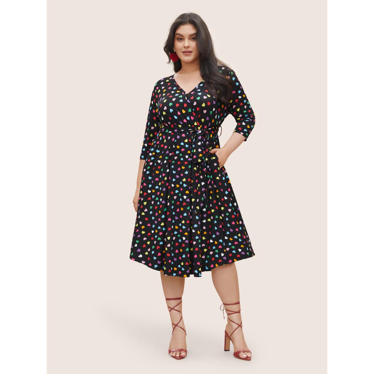 Plus Size Colored Heart Print Belted Overlap Collar Dress Black Women Casual Belted Overlap Collar Elbow-length sleeve Curvy Midi Dress BloomChic 30/6X Product Image