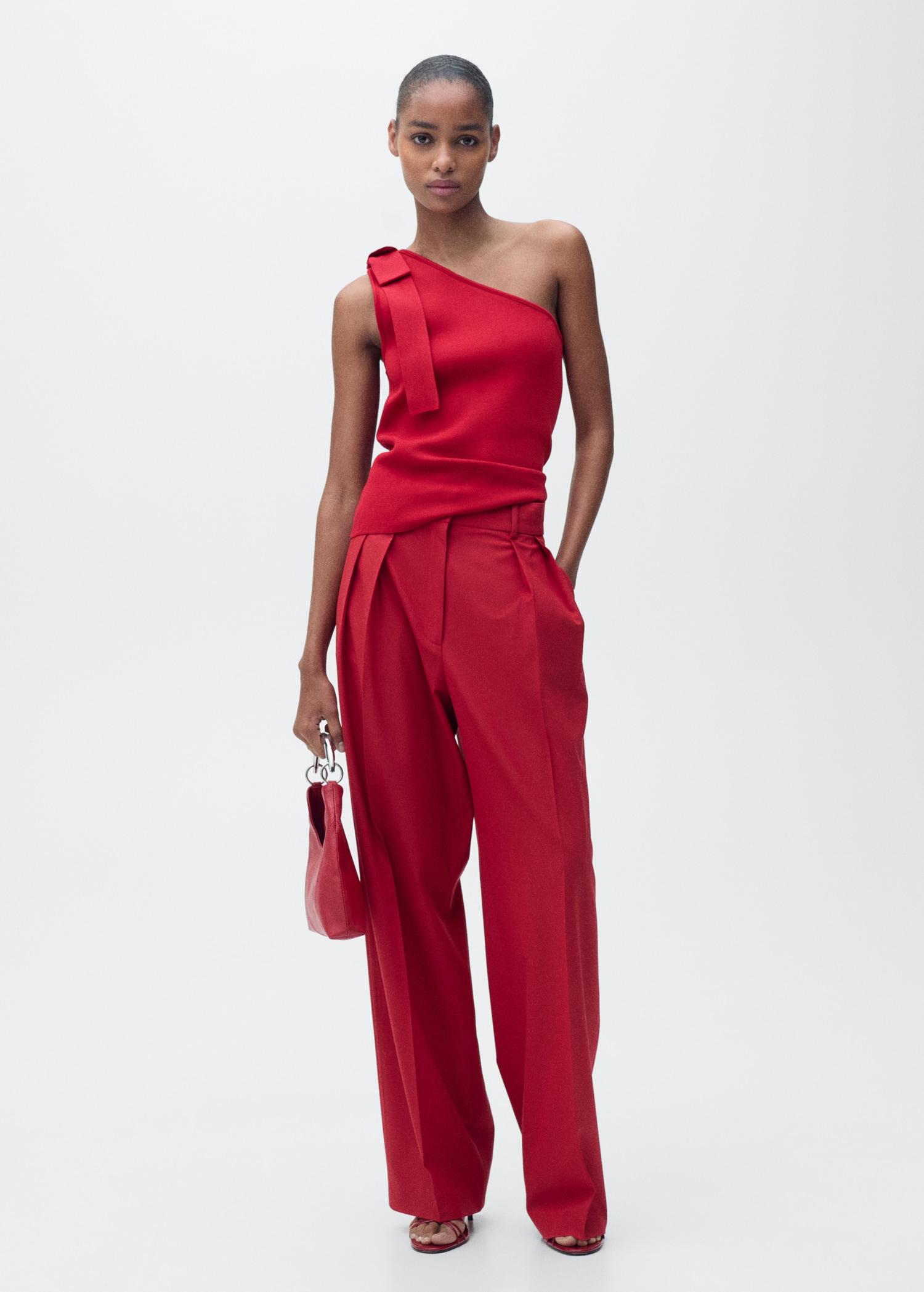 Asymmetrical knitted top with bow - Women | MANGO USA Product Image