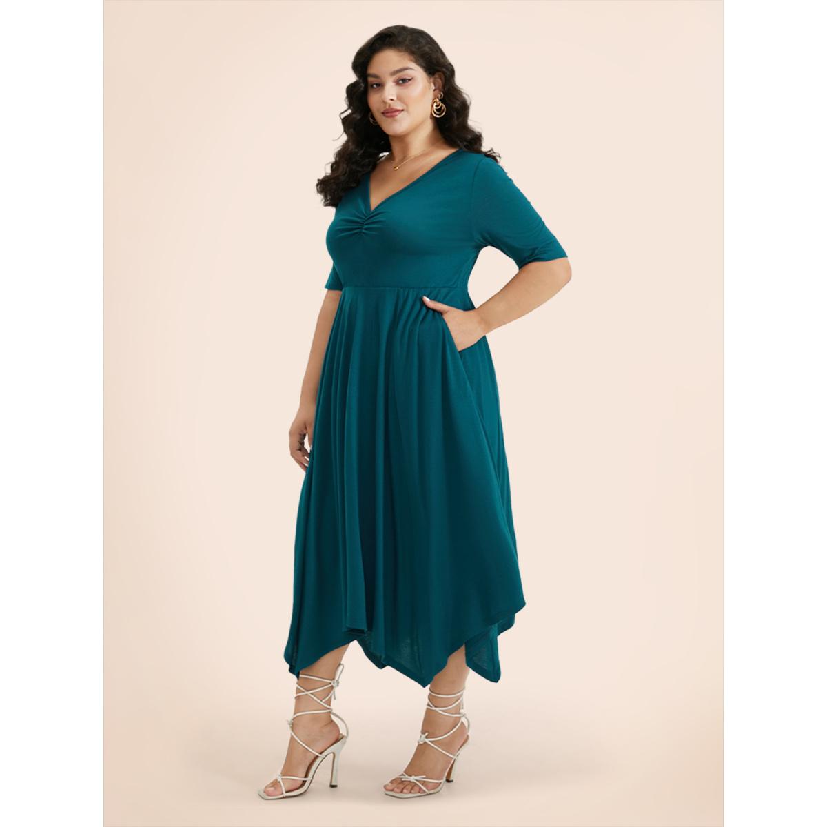 Plus Size Solid Ruched Pocket Asymmetrical Hem Dress Cerulean Women Elegant Gathered V-neck Short sleeve Curvy Midi Dress BloomChic 28/5X Product Image