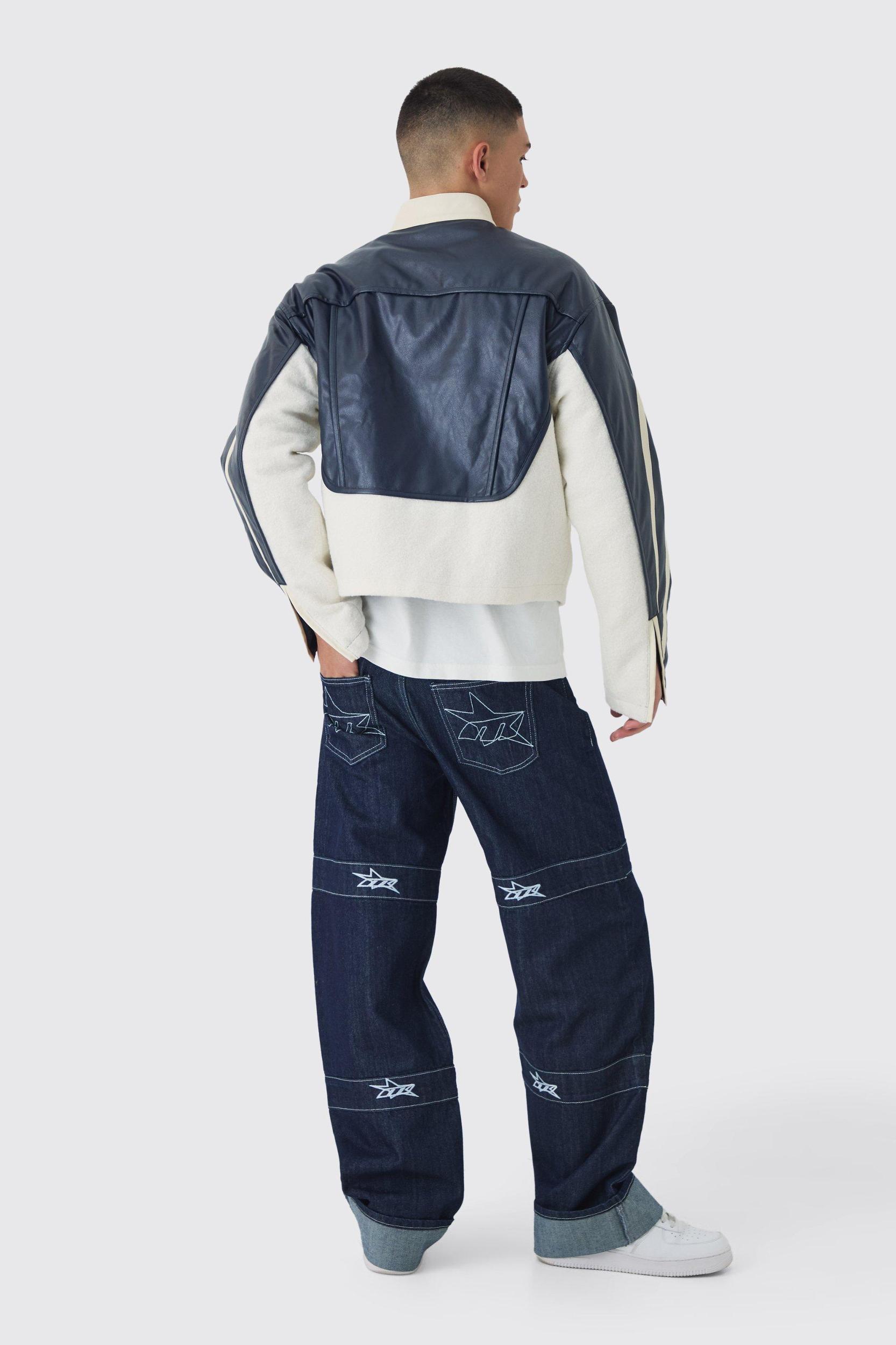 Relaxed Rigid Indigo Contrast Embroidered Strap Cuffed Jeans | boohooMAN USA Product Image