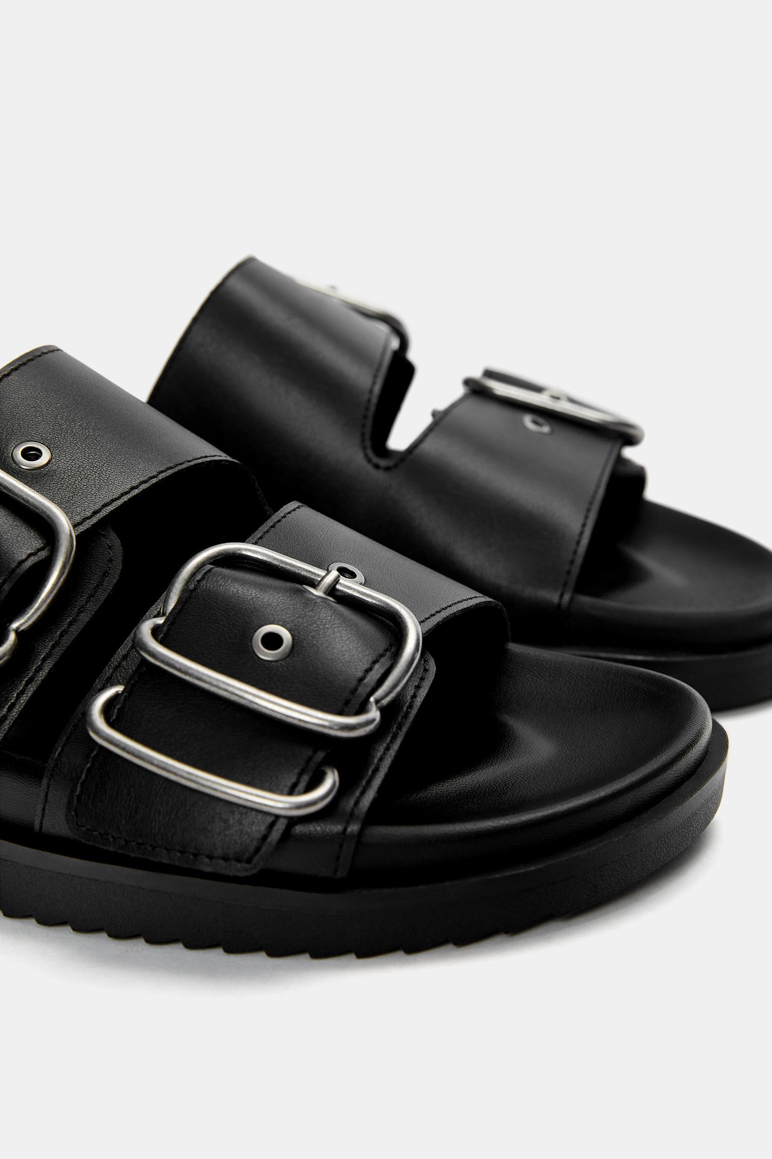 Flat sandals with buckles Product Image