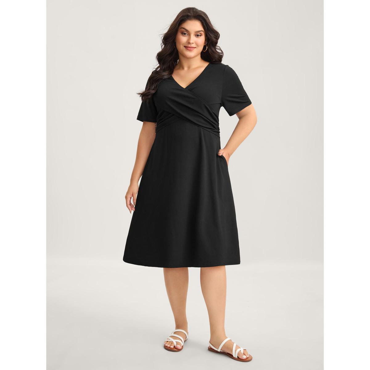 Plus Size Overlap Bodice Solid Knit Pockets Midi Dress Black Women Leisure Overlap Collar Short sleeve Curvy BloomChic 12/L Product Image