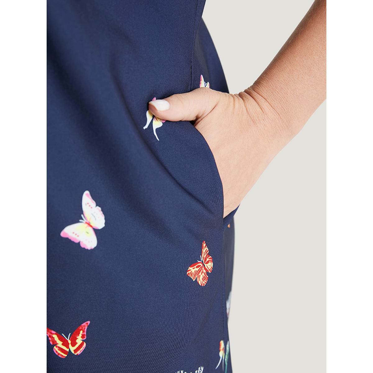 Plus Size Butterfly & Floral Round Neck Print Pocket Knee Dress Indigo Women Vacation Pocket Round Neck Short sleeve Curvy Knee Dress BloomChic 22-24/3X Product Image