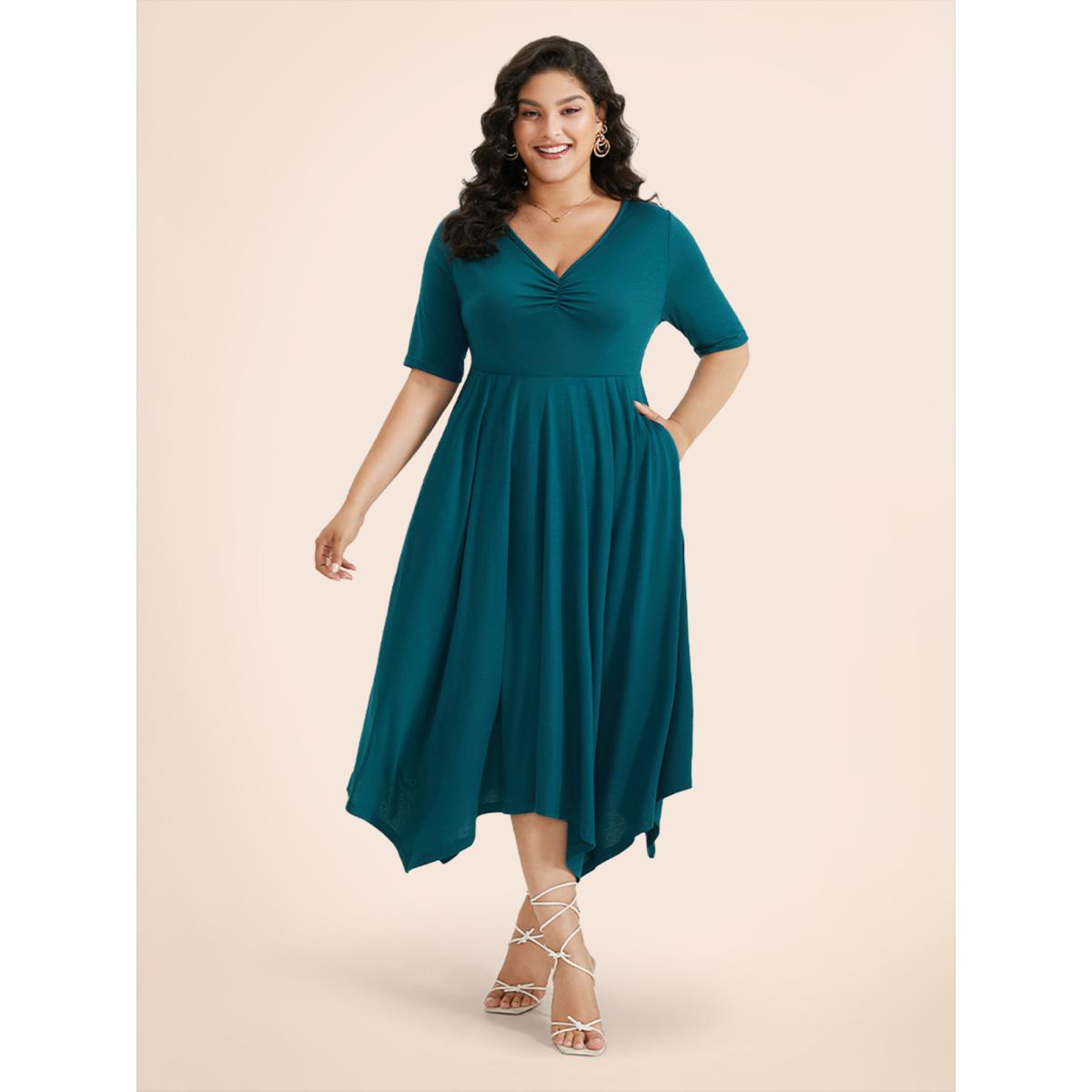 Plus Size Solid Ruched Pocket Asymmetrical Hem Dress Cerulean Women Elegant Gathered V-neck Short sleeve Curvy Midi Dress BloomChic 28/5X Product Image