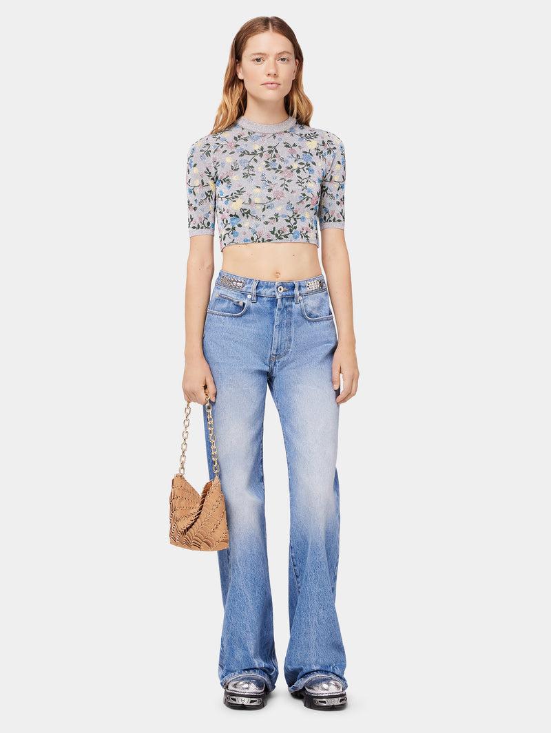 Flared jeans embellished with 1969 discs Product Image