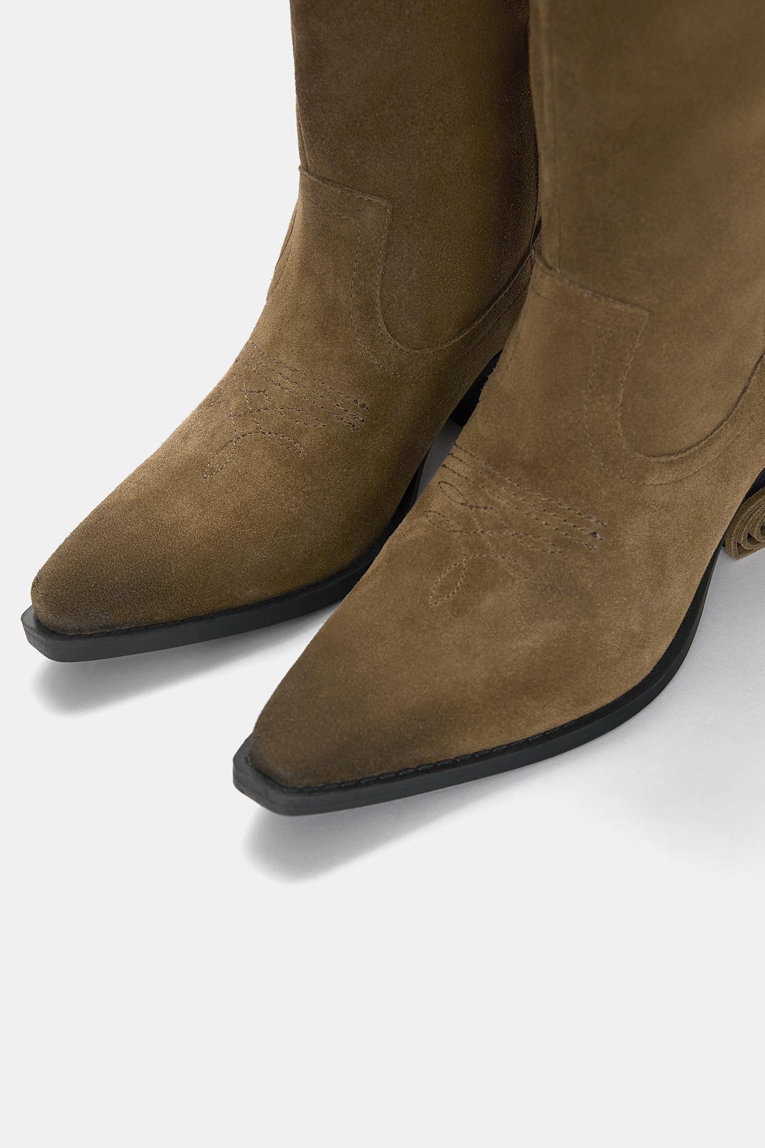 Leather cowboy boots with fringing Product Image