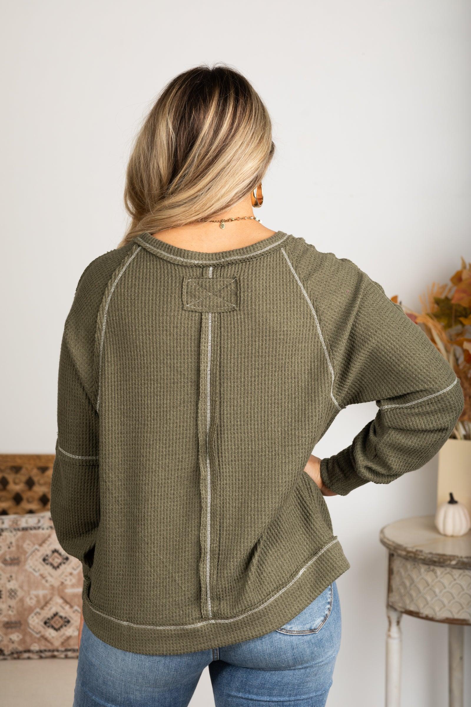 Notched Neck With Exposed Seams Knit Top Product Image