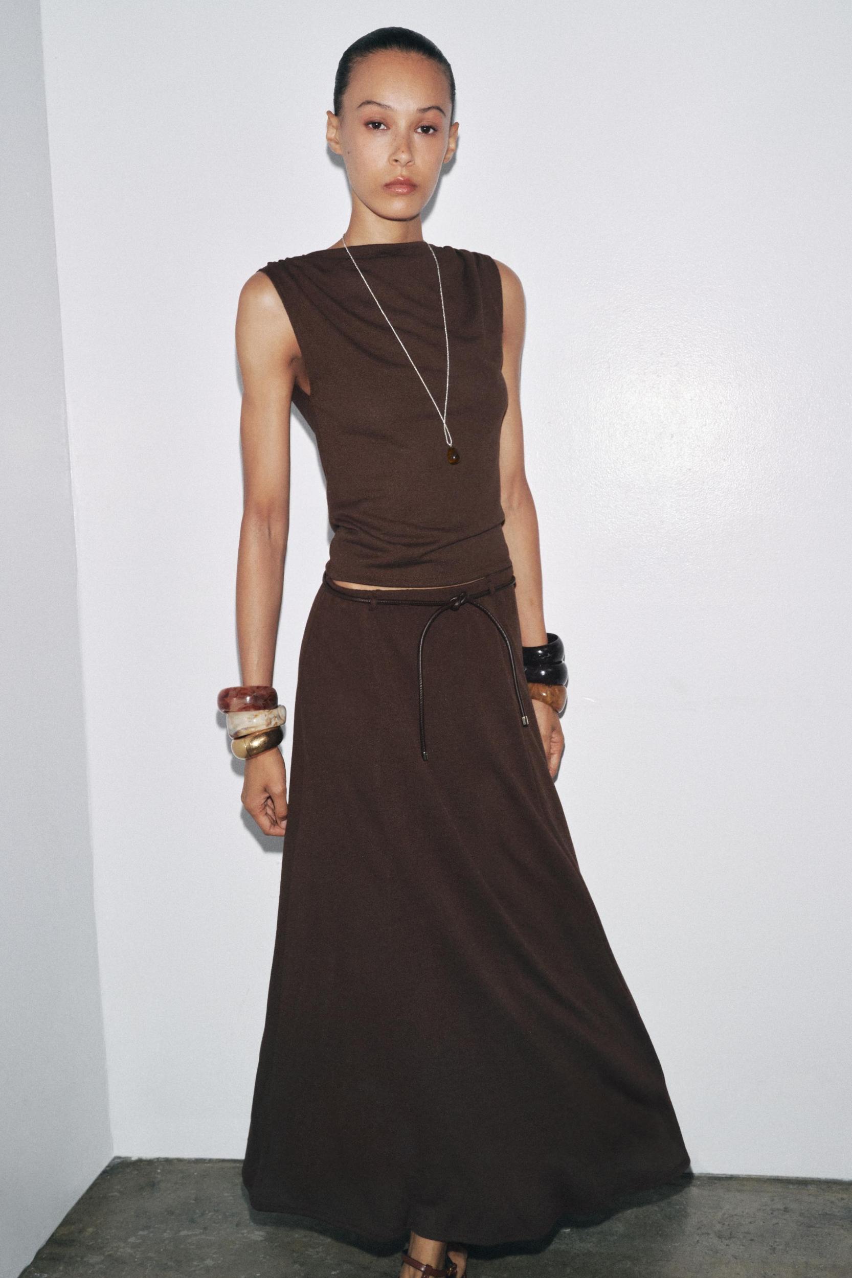 CUT-OUT KNIT SKIRT WITH BELT Product Image