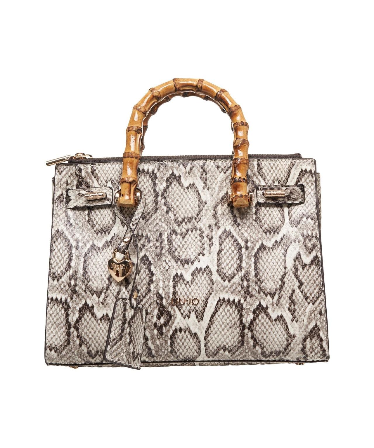Hand bag with snake pattern Product Image