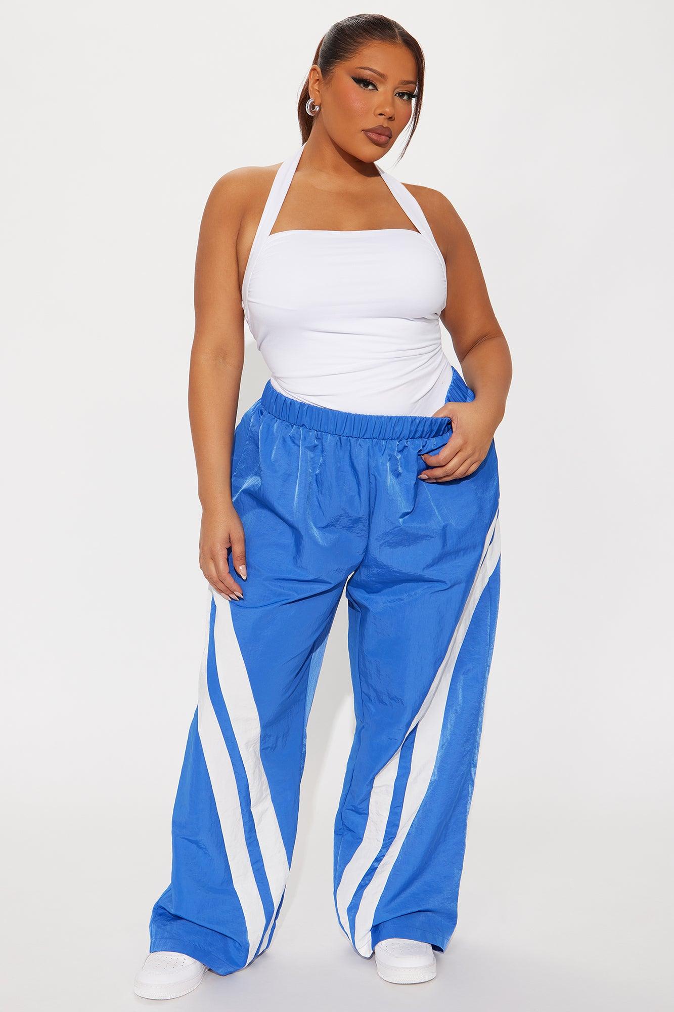 Follow The Curve Windbreaker Track Pant - Blue Female Product Image