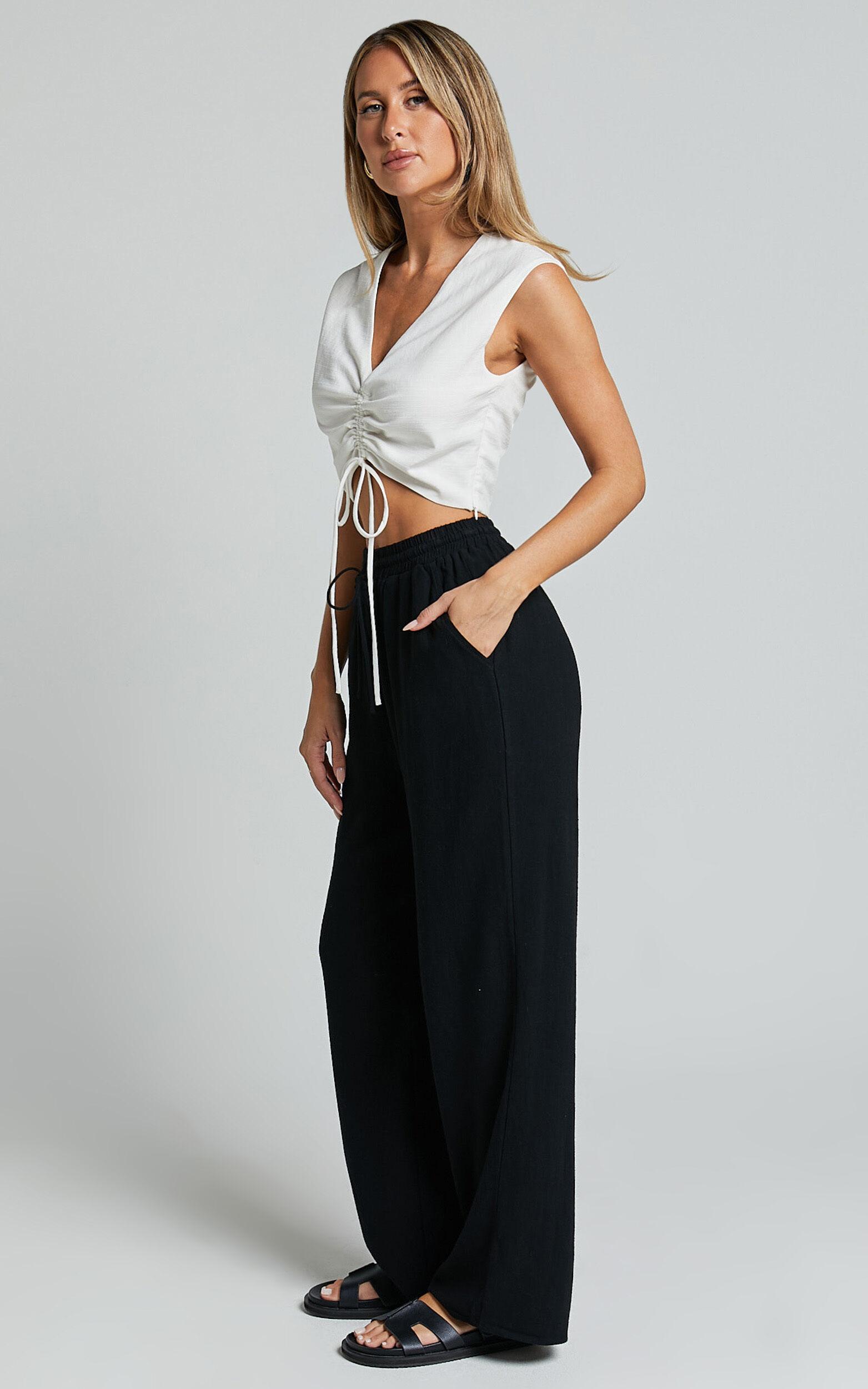 Kala Pants - Mid Waisted Relaxed Elastic Waist Pants in Black Product Image