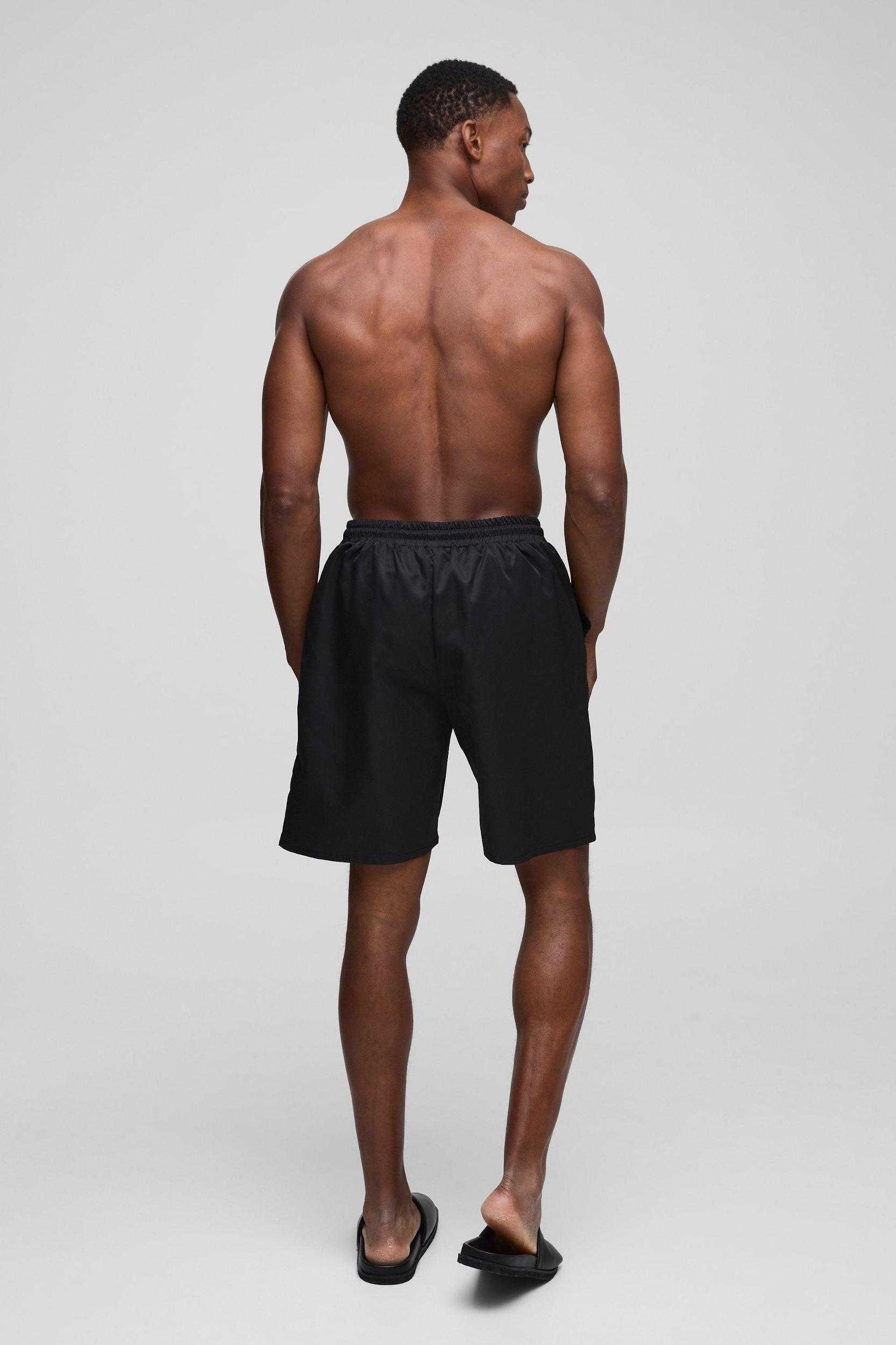 Long Length Swim Trunks in Black | boohooMAN USA Product Image