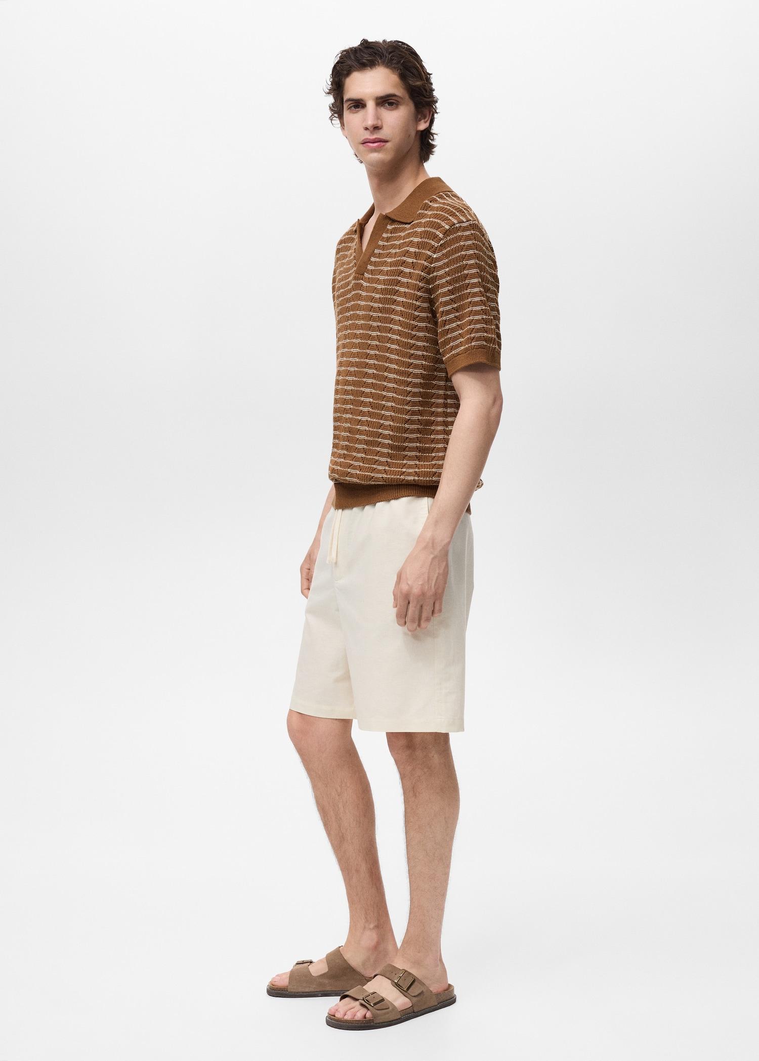 Striped openwork knitted polo shirt - Men | MANGO USA Product Image