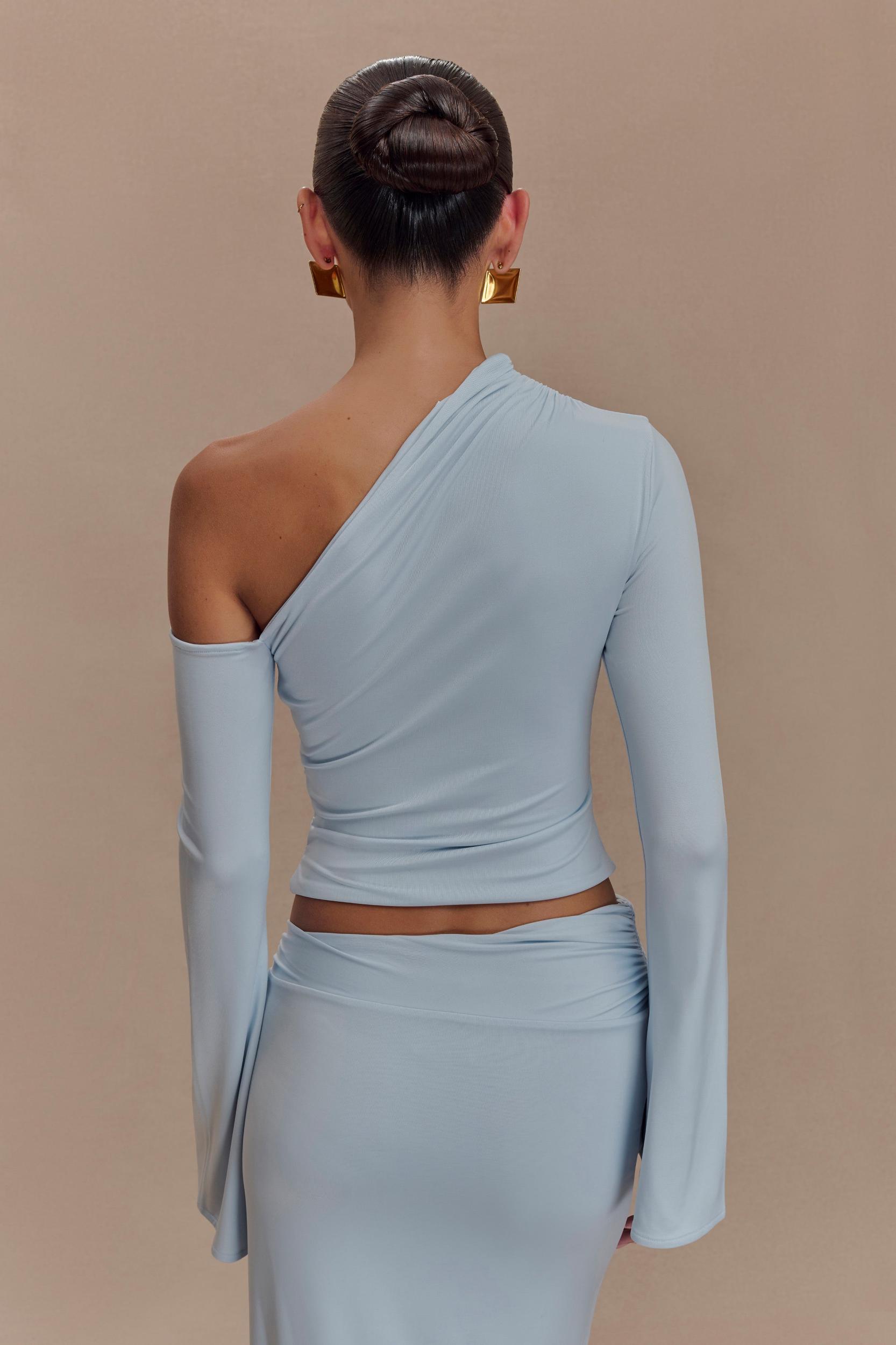 Ainsley Asymmetrical Long Sleeve Top With Floral Hardware - Pale Blue Product Image