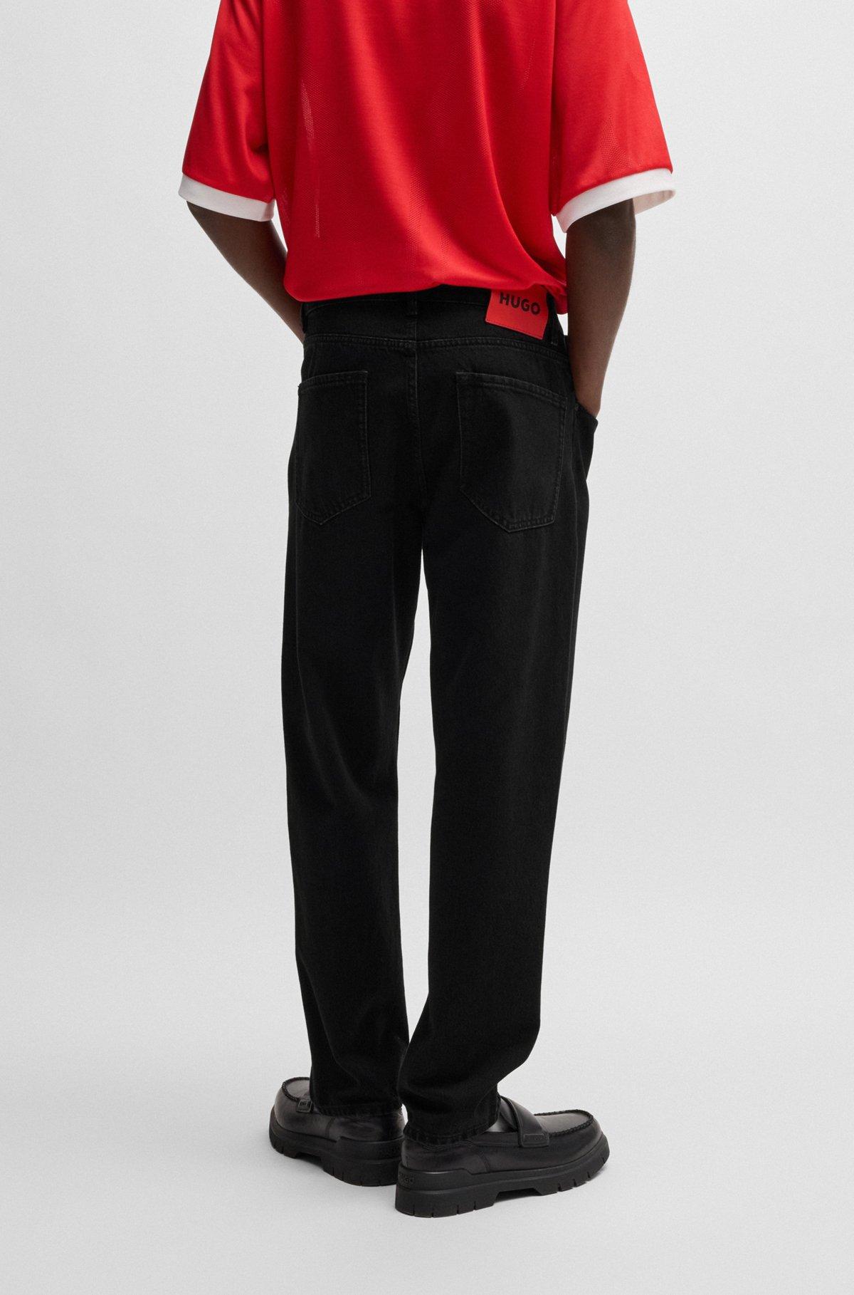 Relaxed tapered-fit jeans in black denim Product Image